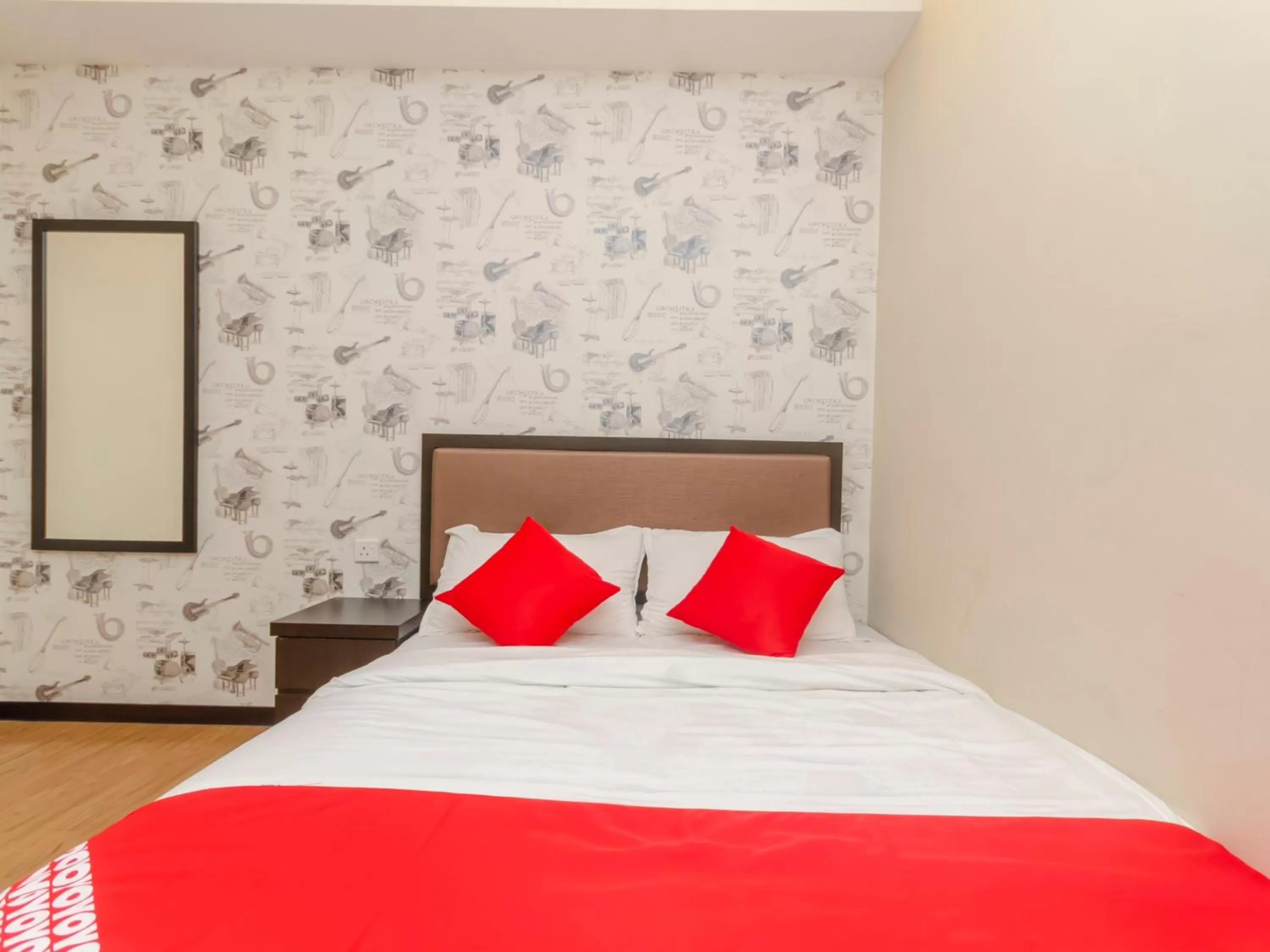 Bedroom in OYO 1214 Oro Hotel