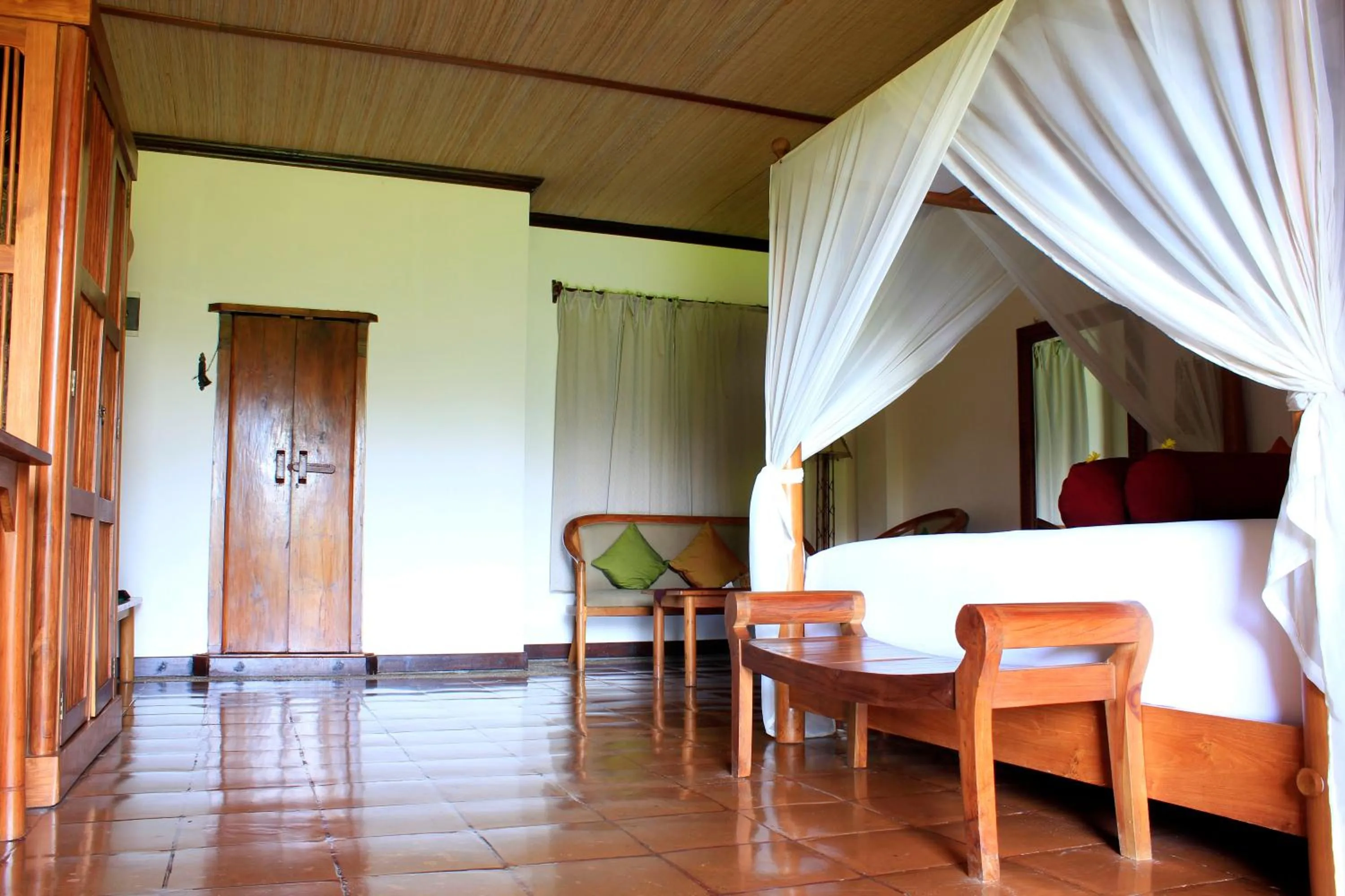 Bed in Junjungan Ubud Hotel and Spa