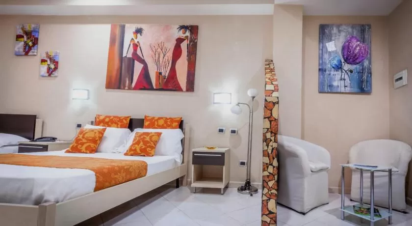 Living room, Bed in Hotel Daytona Palace