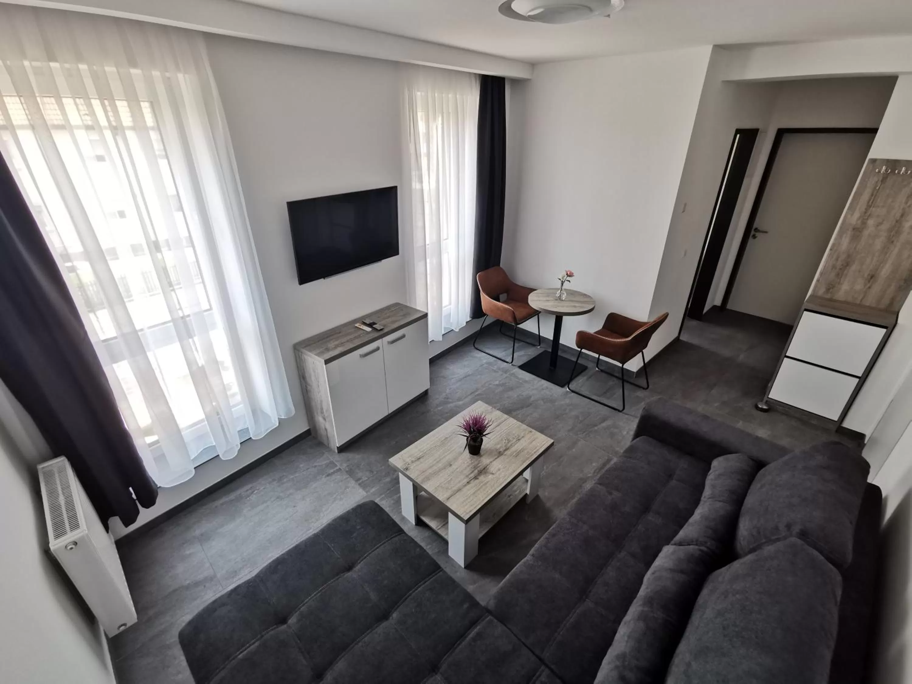 Communal lounge/ TV room in HP Apartments