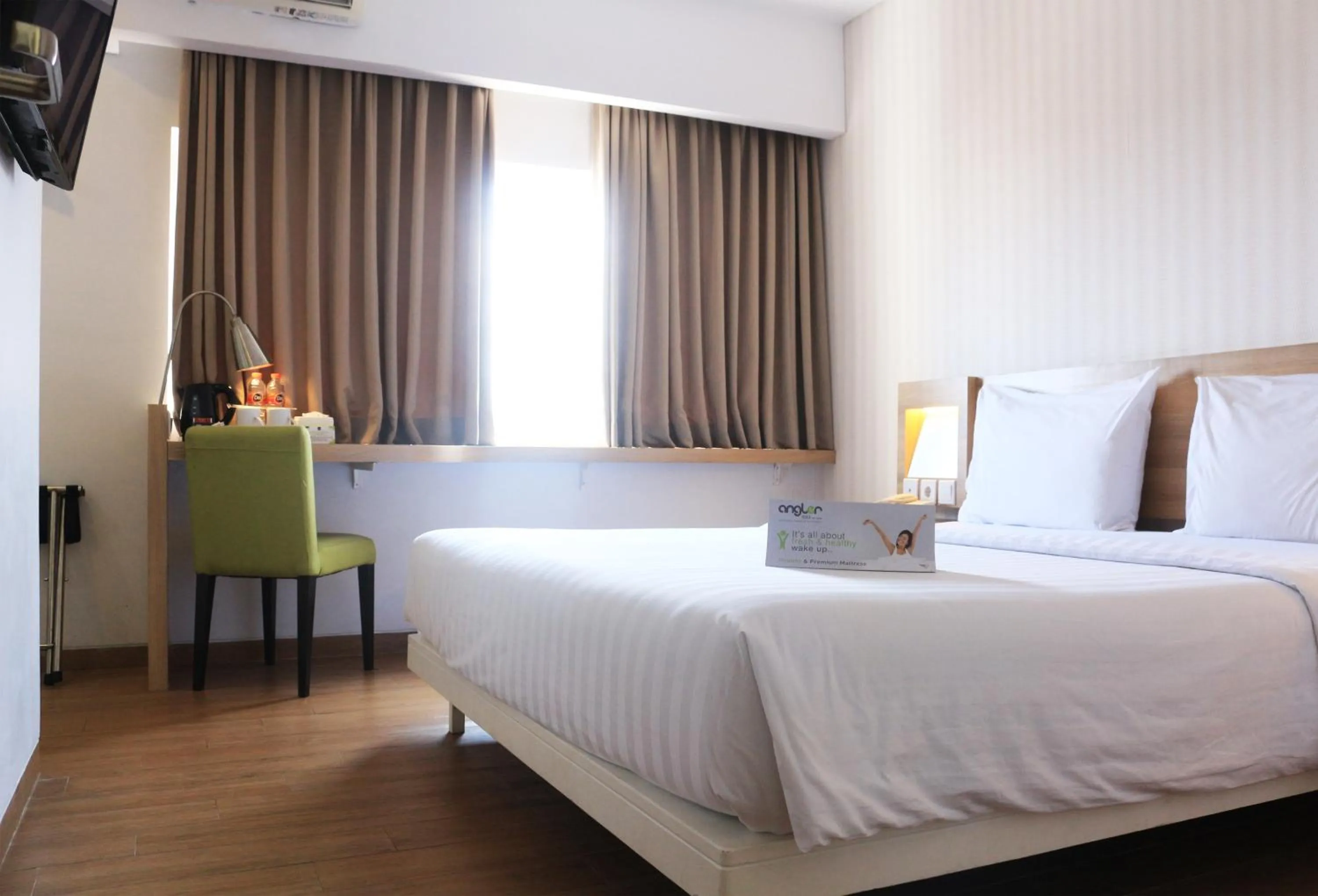 Bedroom, Bed in Whiz Prime Hotel Basuki Rahmat Malang