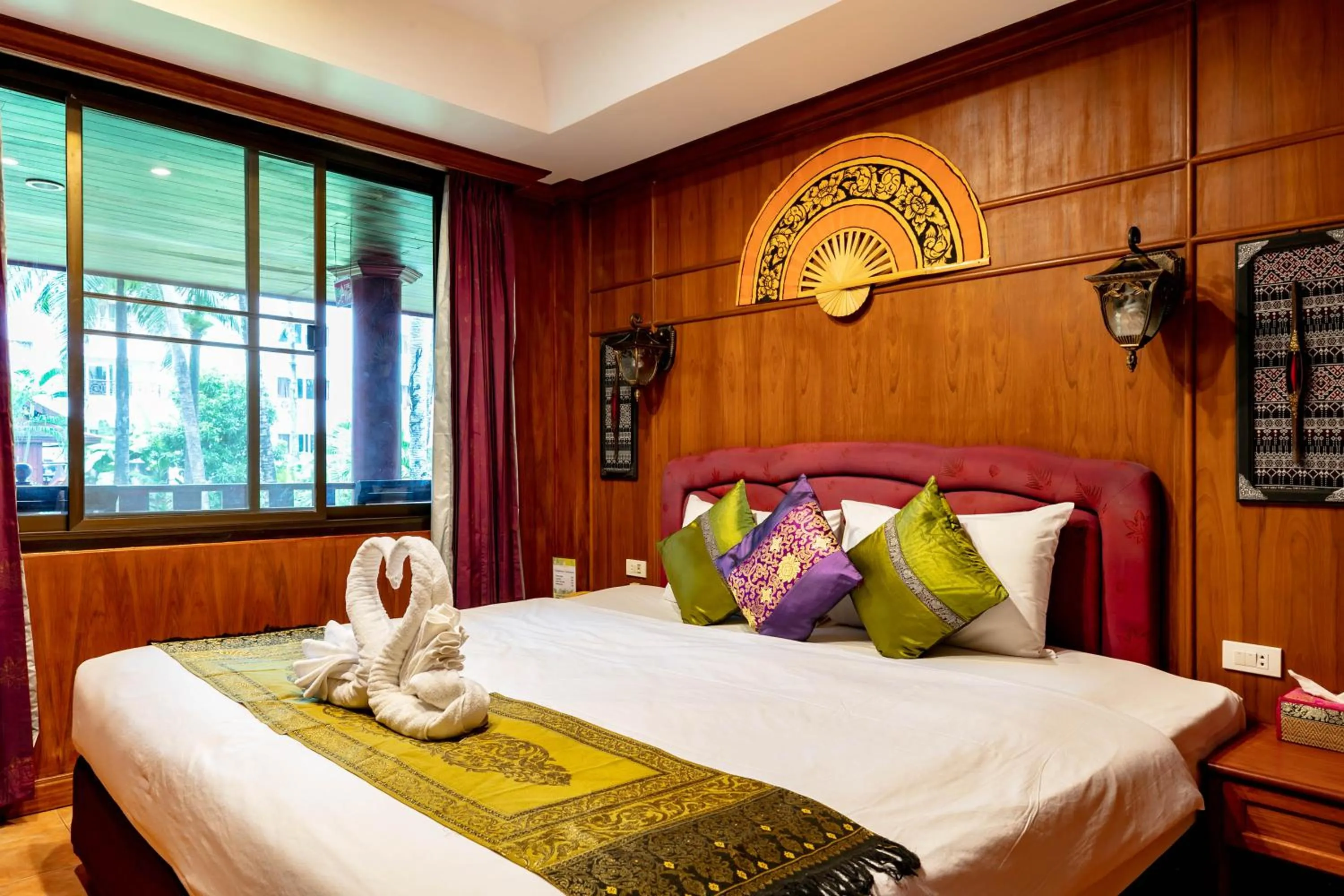 Bedroom, Bed in Royal Phawadee Village Patong - 2 Minutes walk to the beach