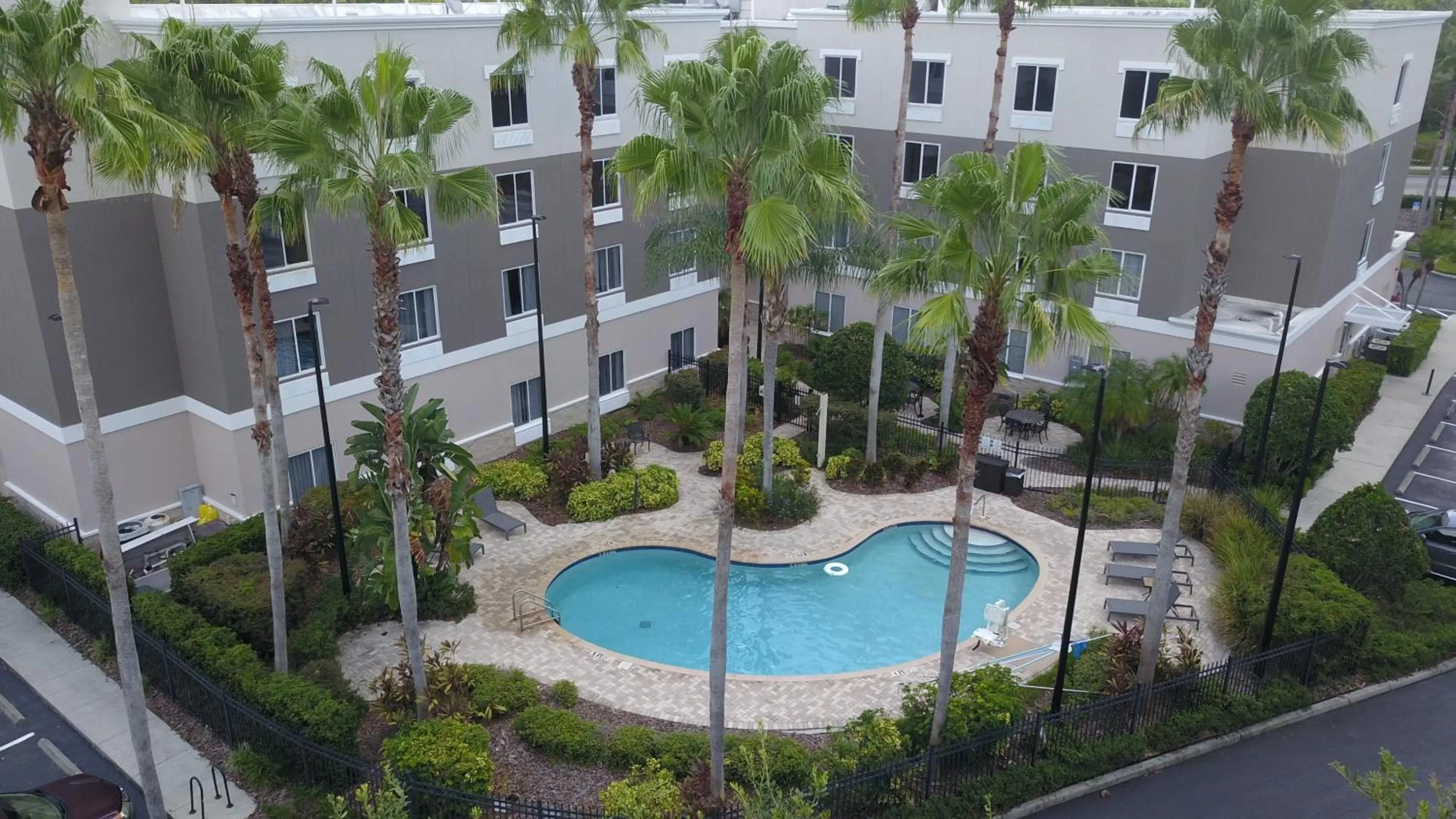 Swimming pool in Holiday Inn Express and Suites Tampa I-75 at Bruce B. Downs by IHG