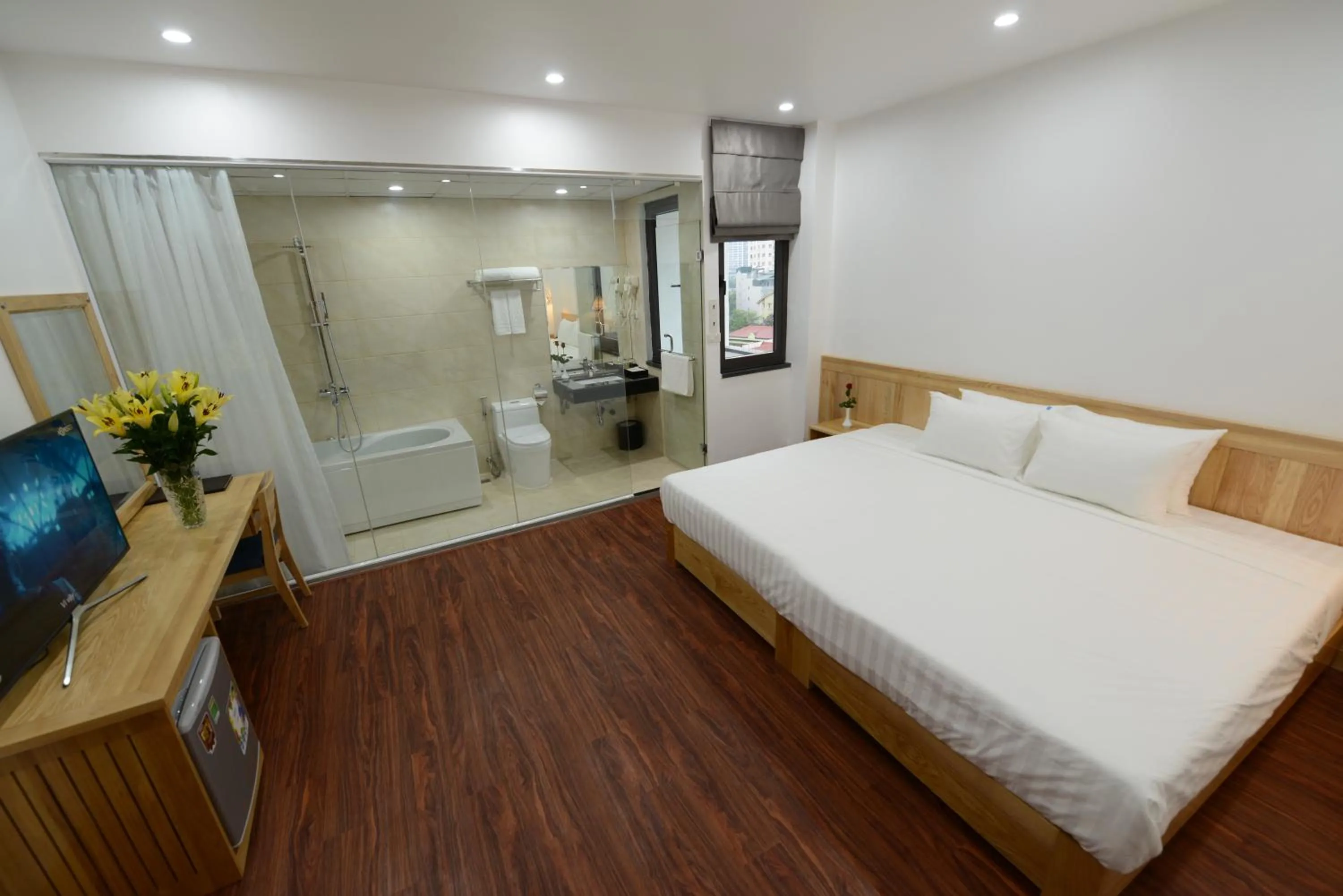 Bed in Blue Hanoi Inn City Hotel