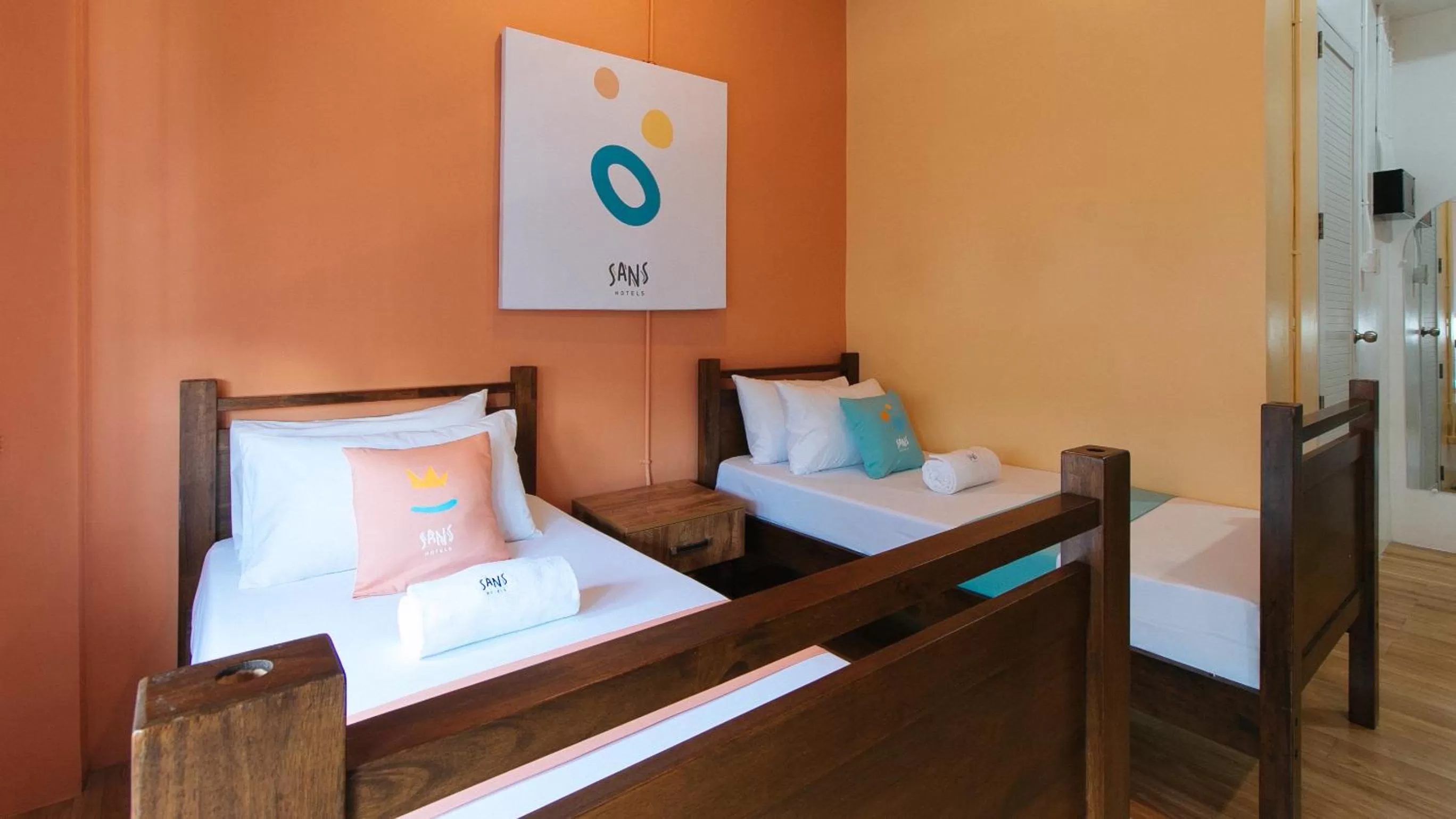 Bed in Sans Hotel Laperal Manila