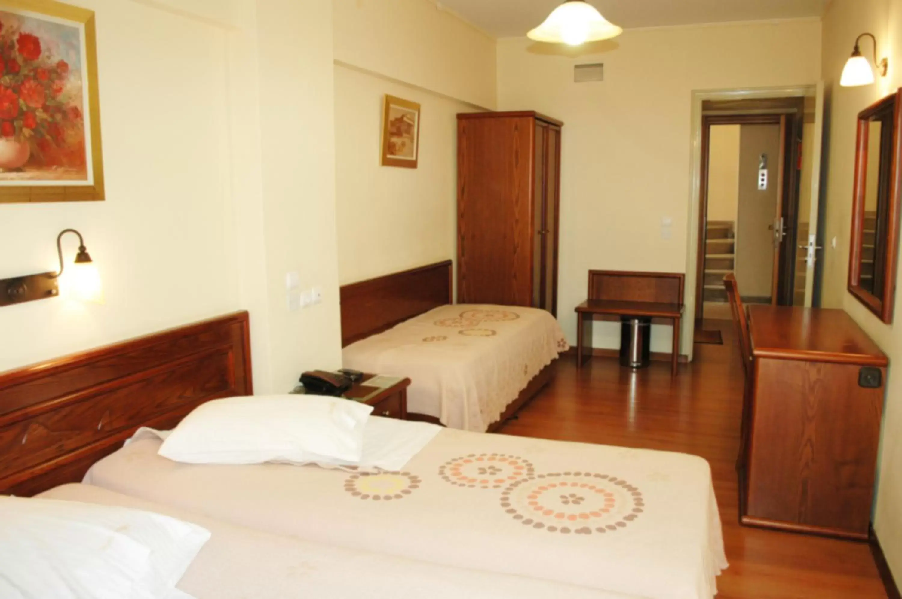 Quadruple Room in Omiros Hotel Quadruple Room in Omiros Hotel