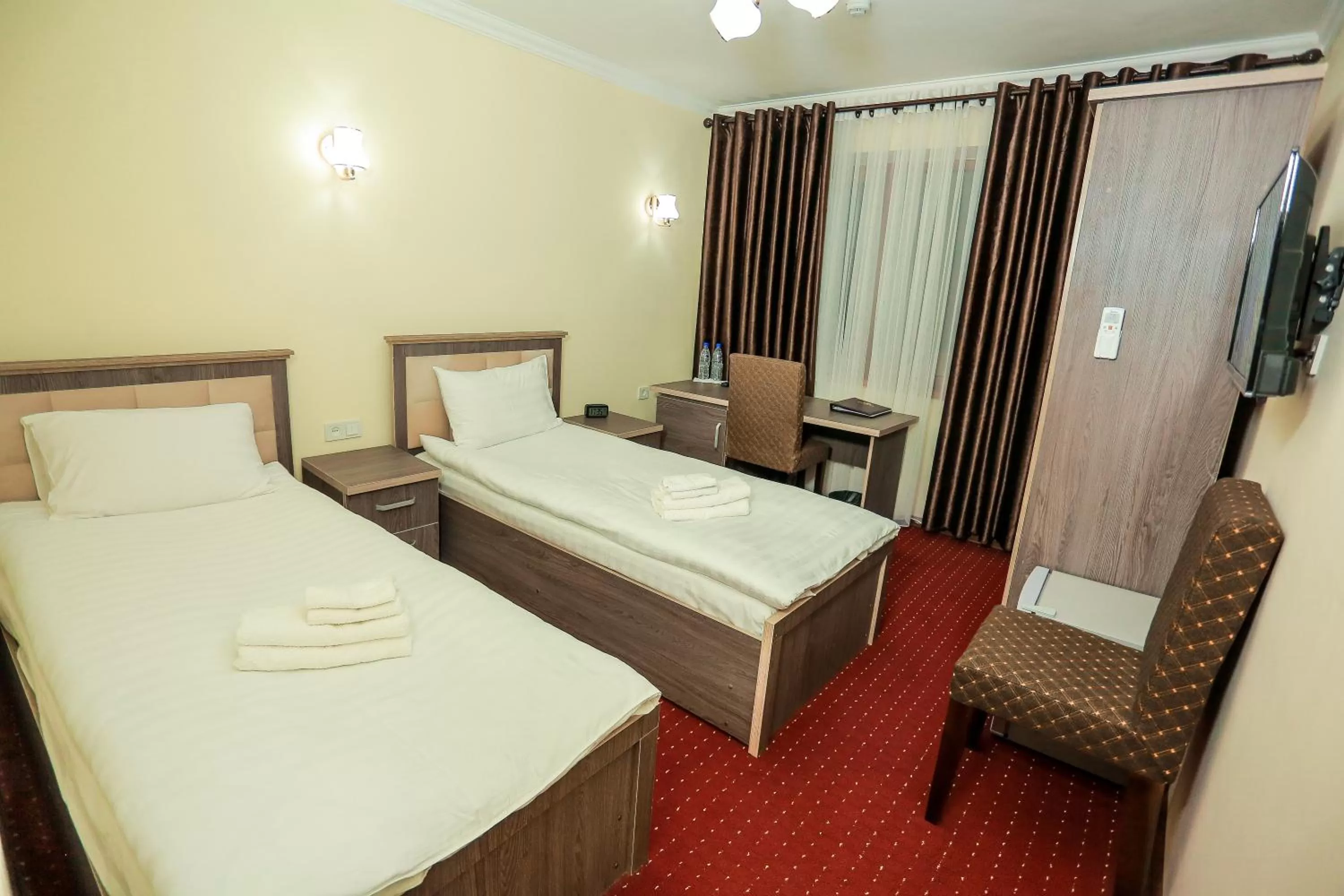 Bed in Sugdiyon Hotel