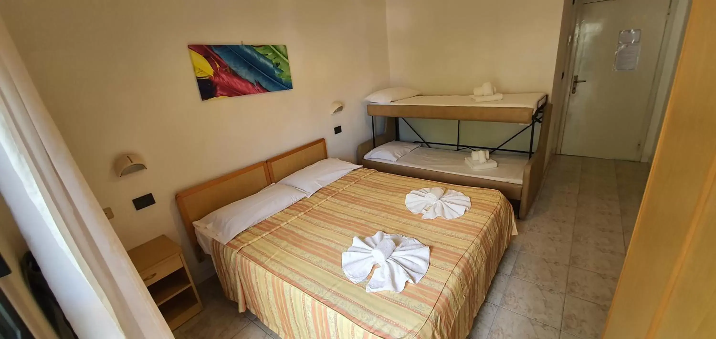 Quadruple Room with Balcony in Hotel Vela Azzurra Quadruple Room with Balcony in Hotel Vela Azzurra