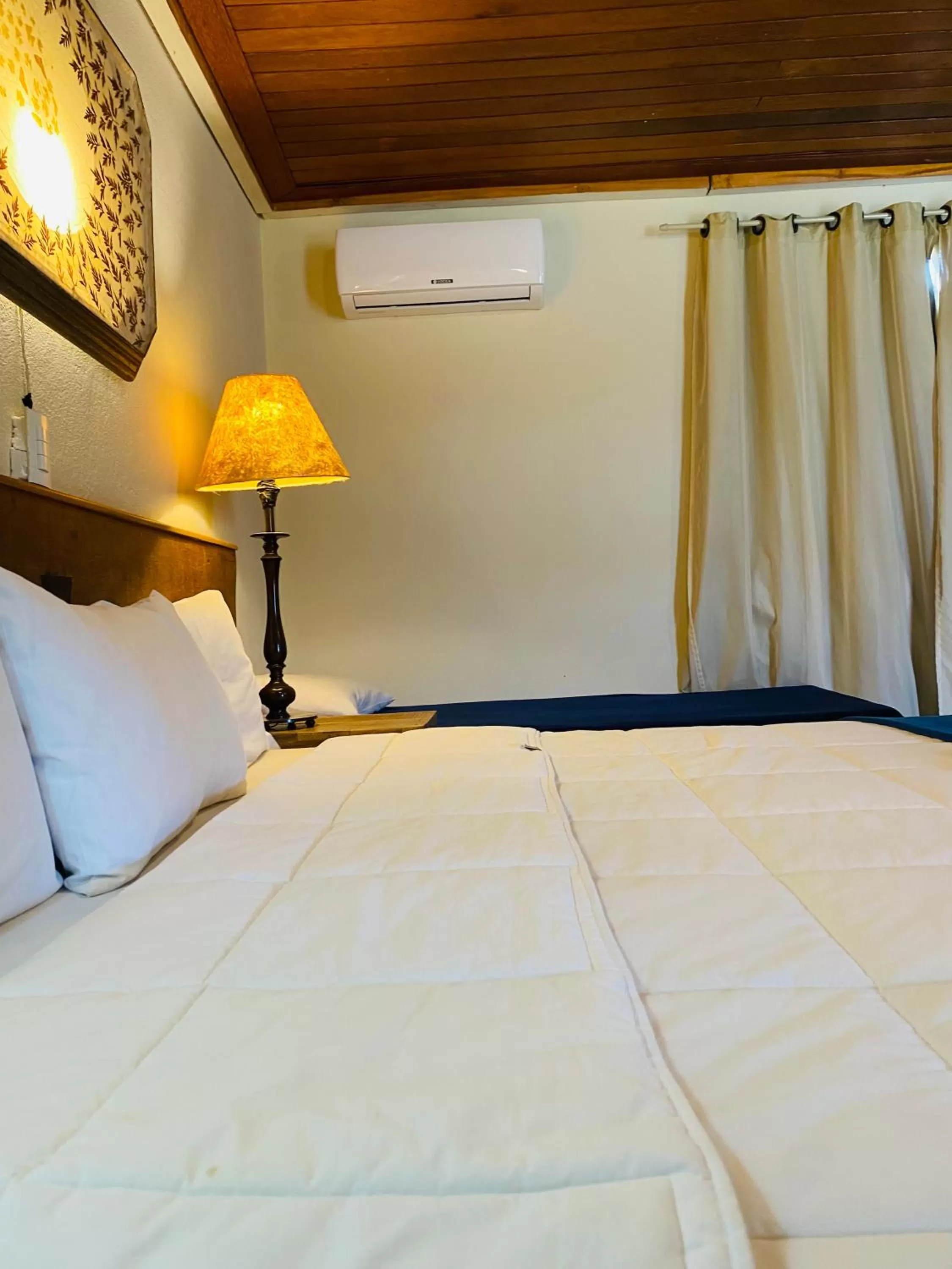 Bed in POUSADA CHARLOTTE