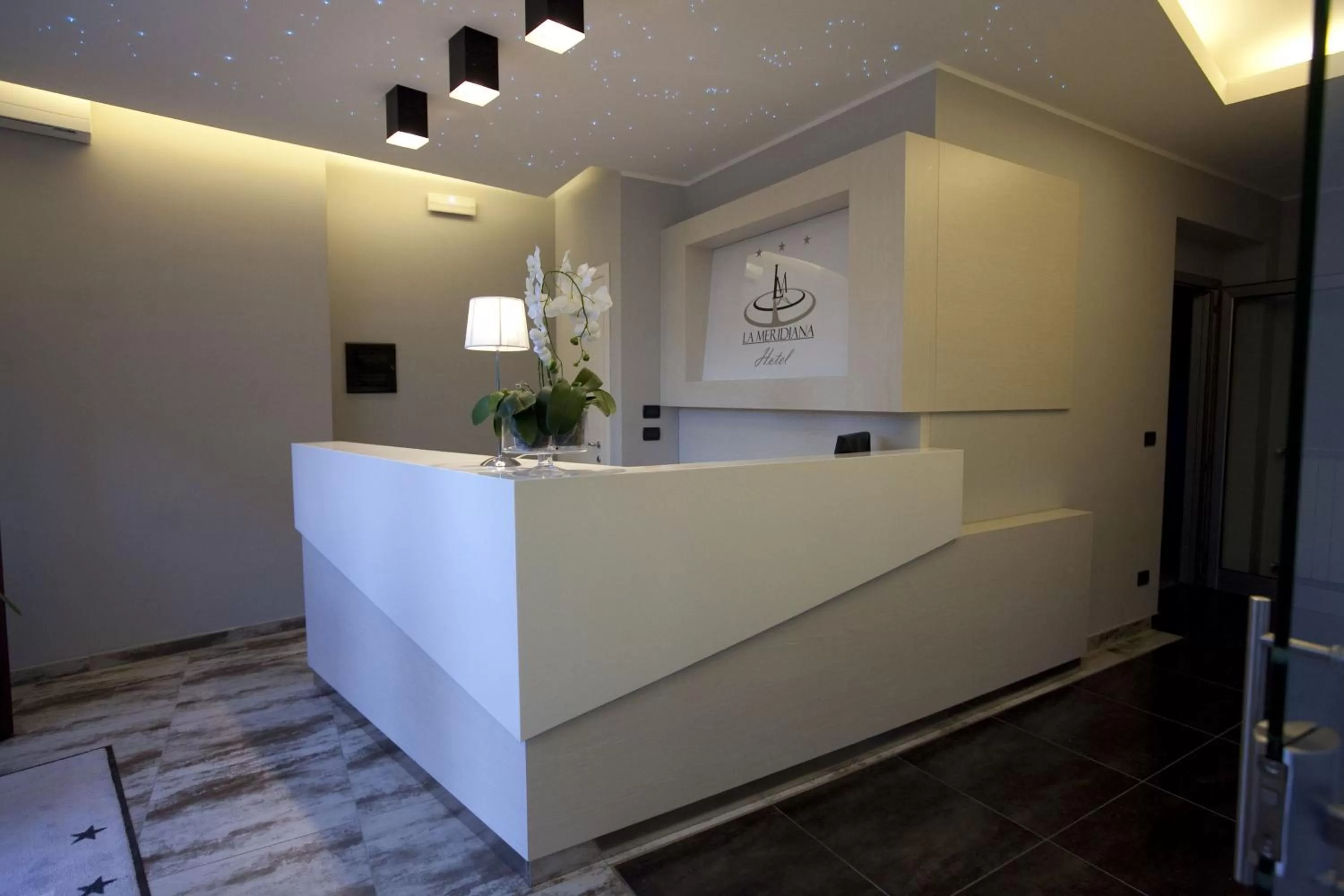 Lobby or reception in Hotel La Meridiana