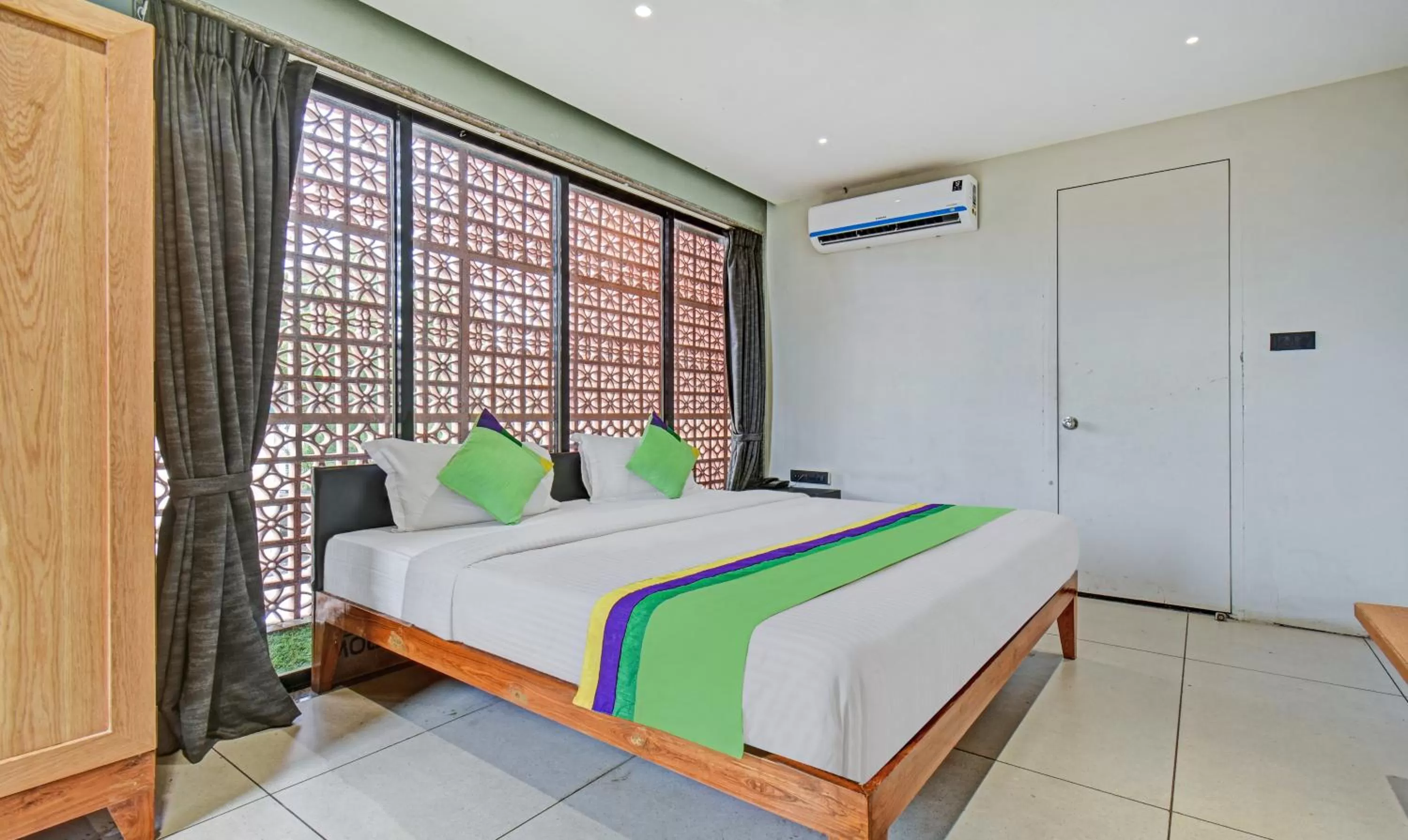 Bedroom, Bed in Treebo Aroma Executive