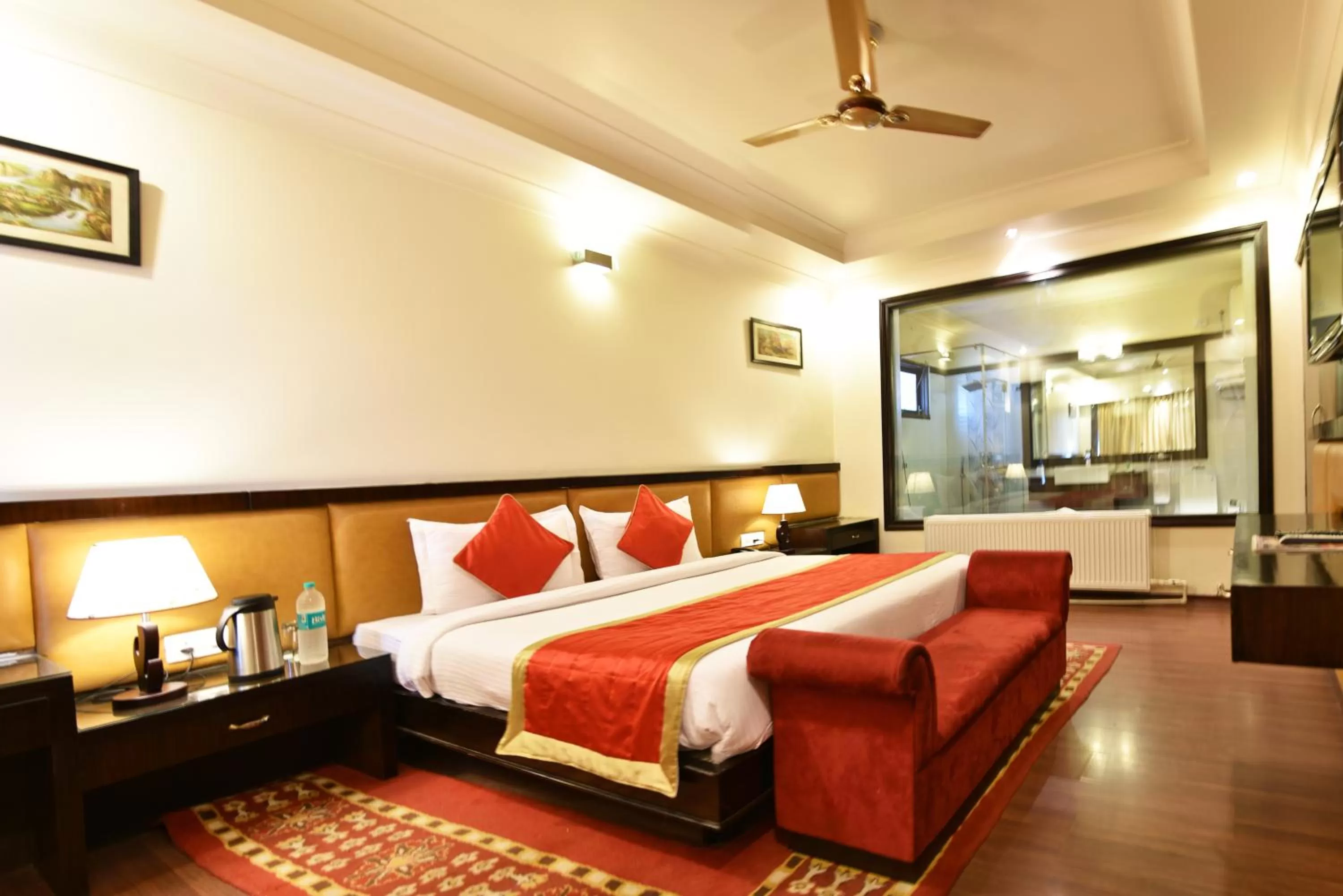 Photo of the whole room, Bed in Indraprastha Resort - Centrally Heated Rooms, with Gym, Games & Spa
