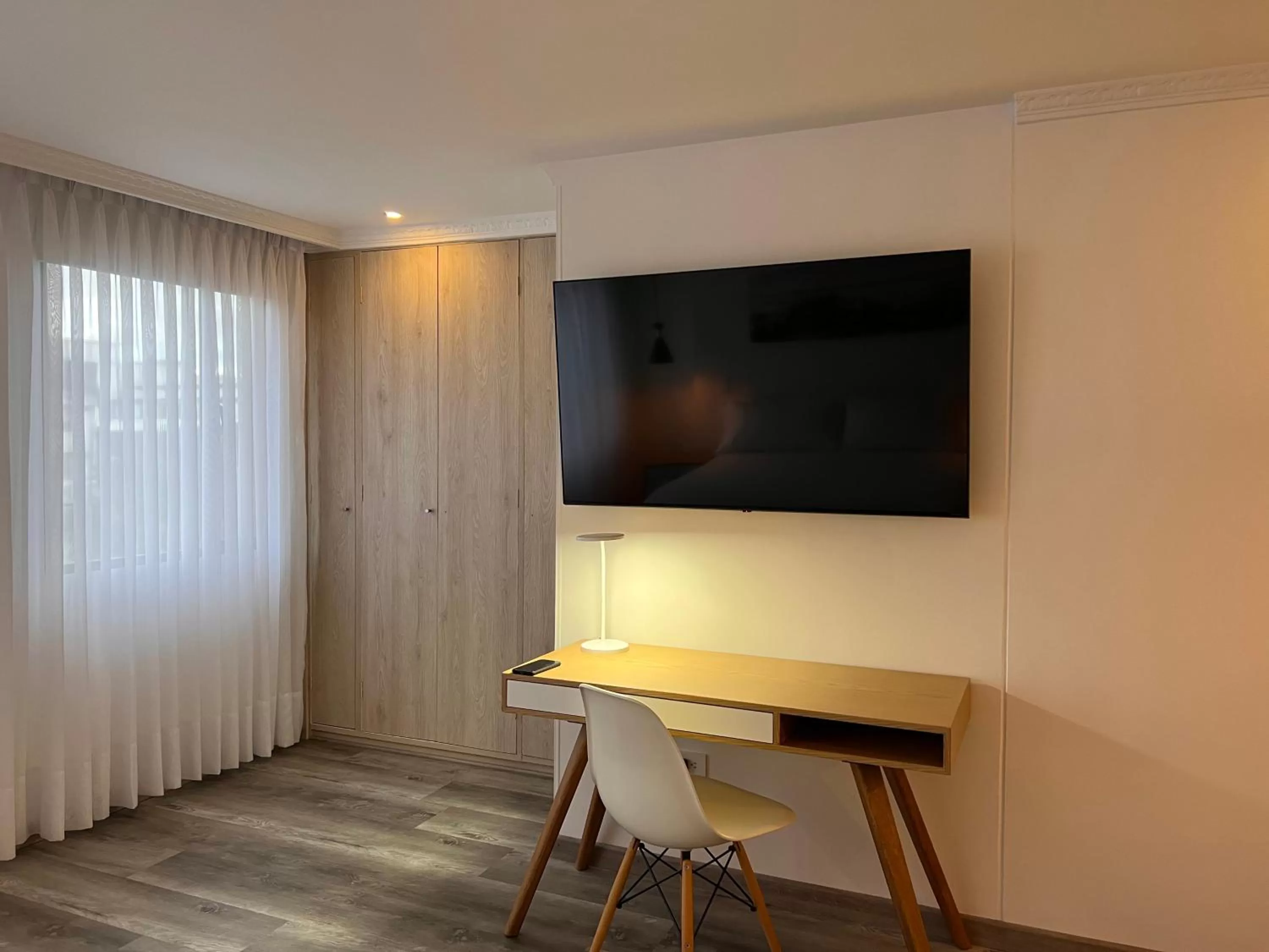 TV and multimedia, TV/Entertainment Center in Suites 109 GH Usaquén