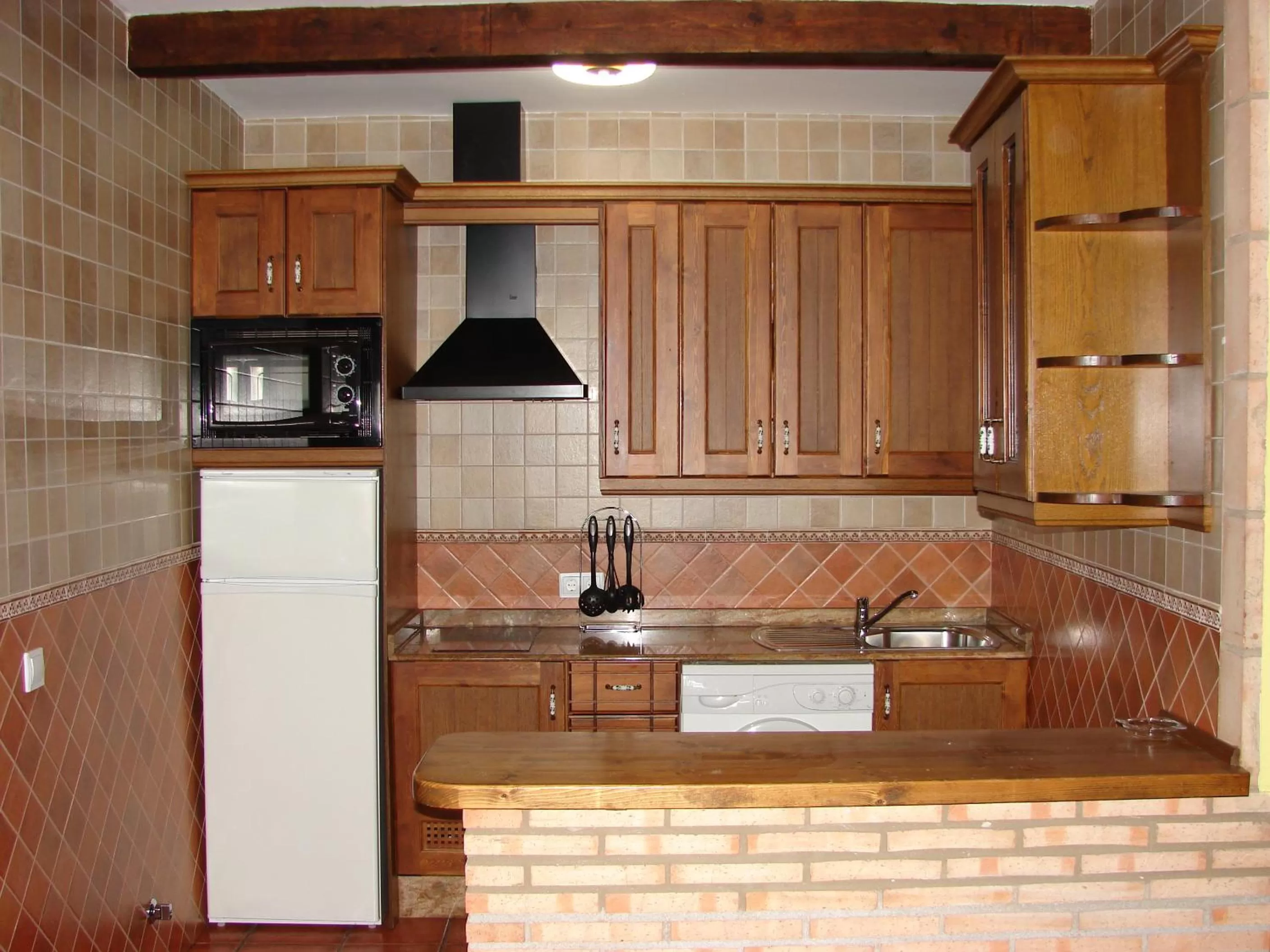 Kitchen or kitchenette in Apartamentos Sierra de Segura