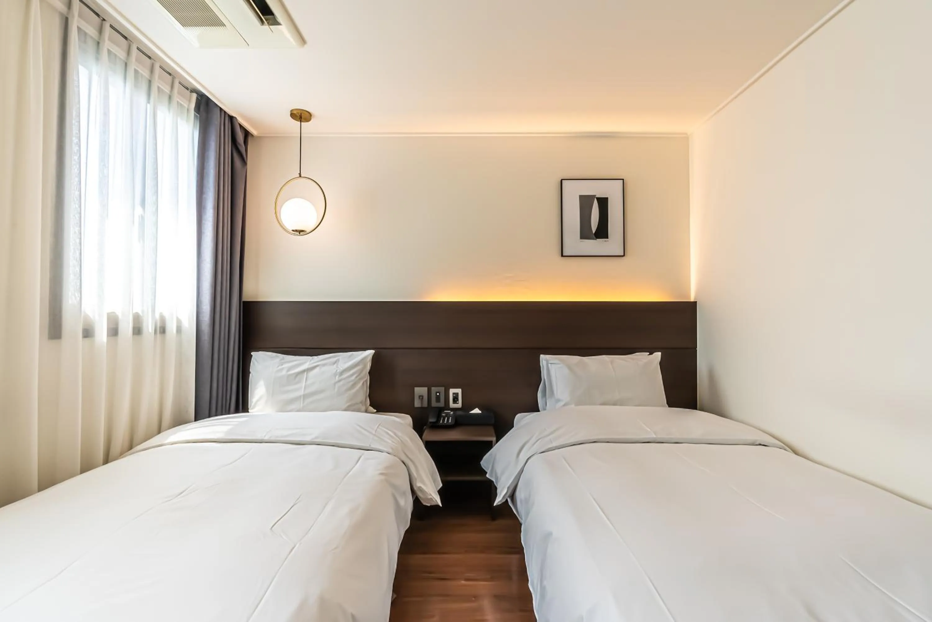 Bed in Hotel The Grang Jungmun