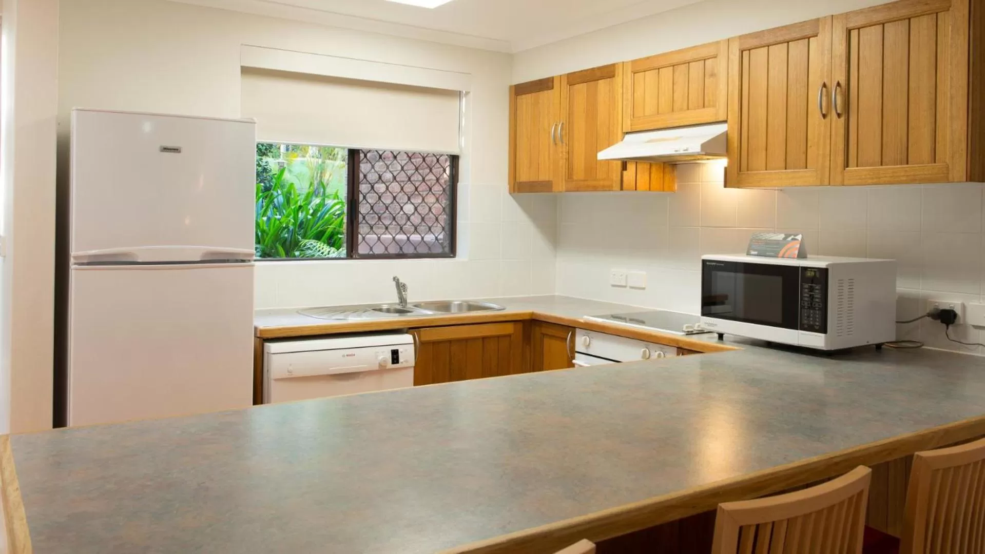 Kitchen or kitchenette in Boambee Bay Resort