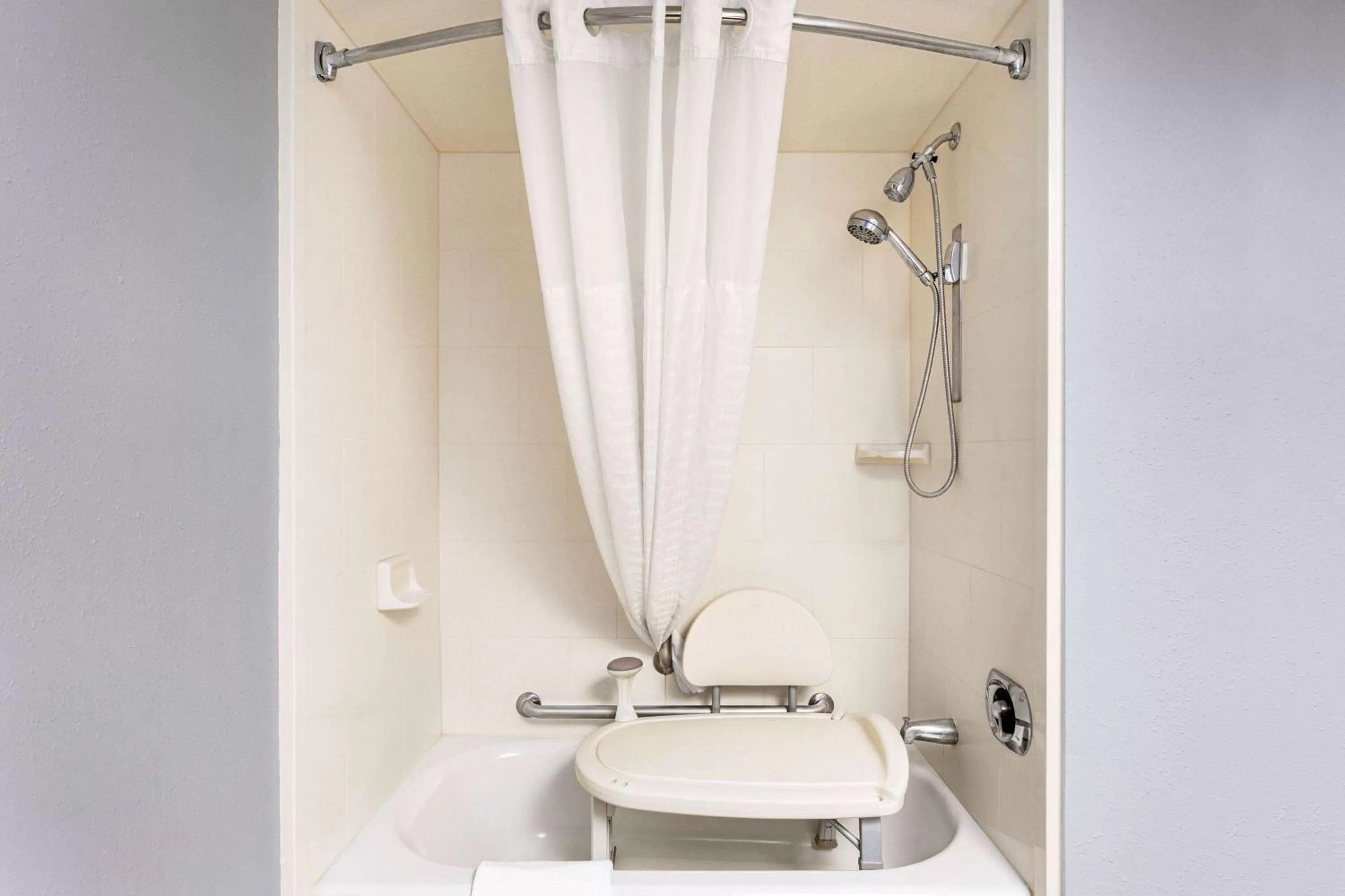 Shower in AmericInn by Wyndham Madison West