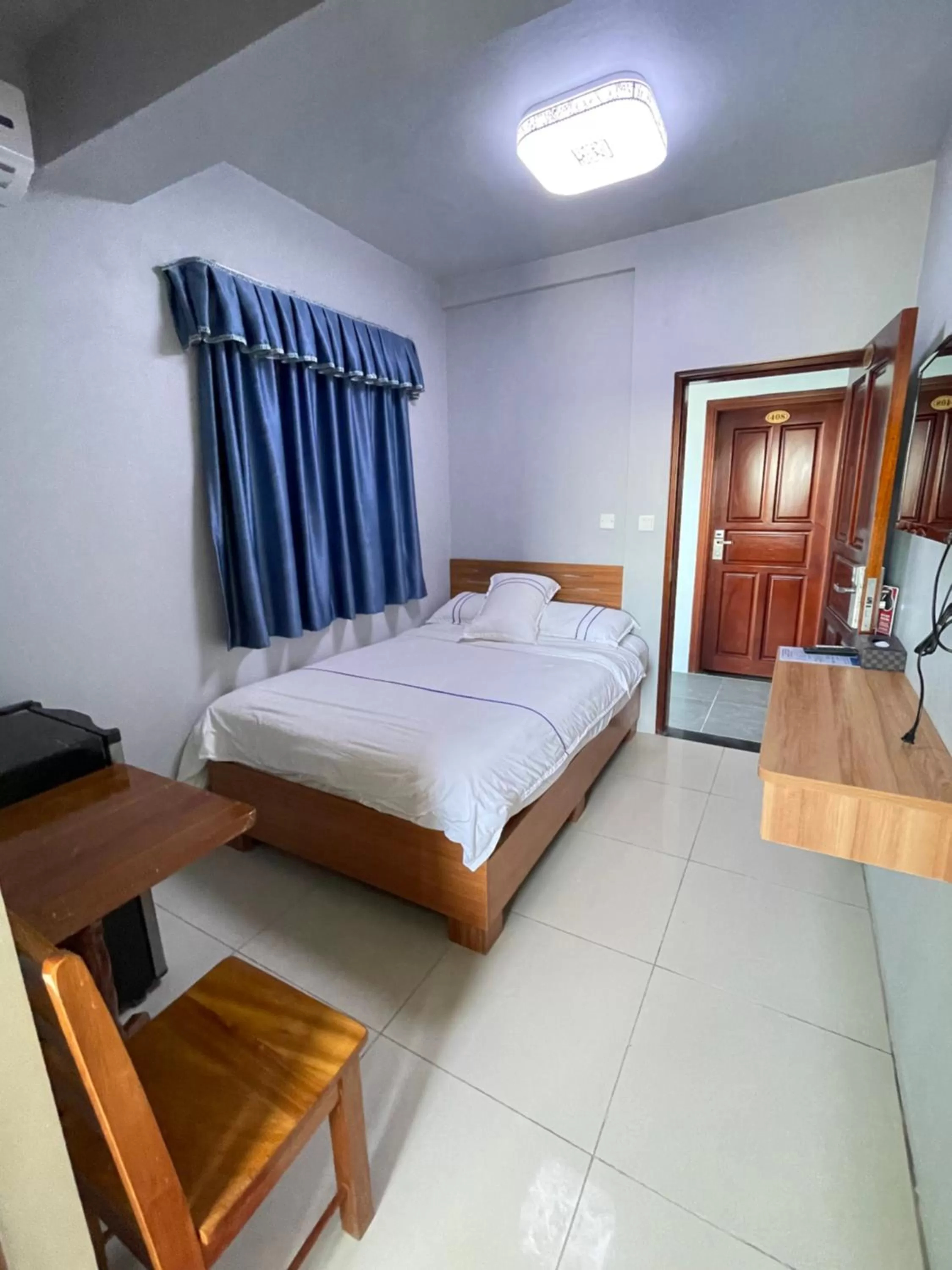 Bed in Caye Caulker Beach Hotel