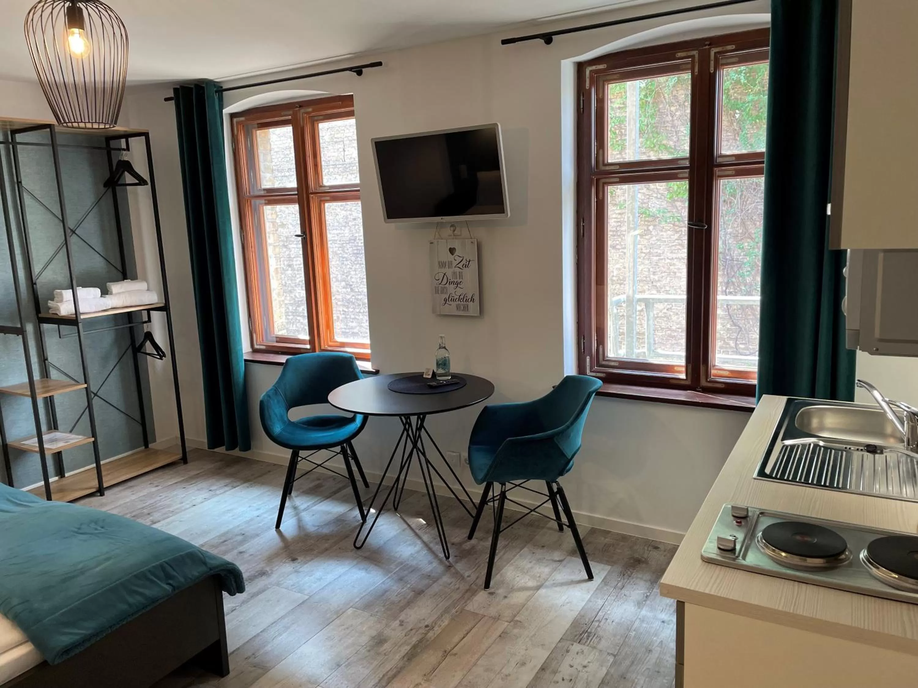 Kitchen or kitchenette in Aparthotel Walhalla Potsdam