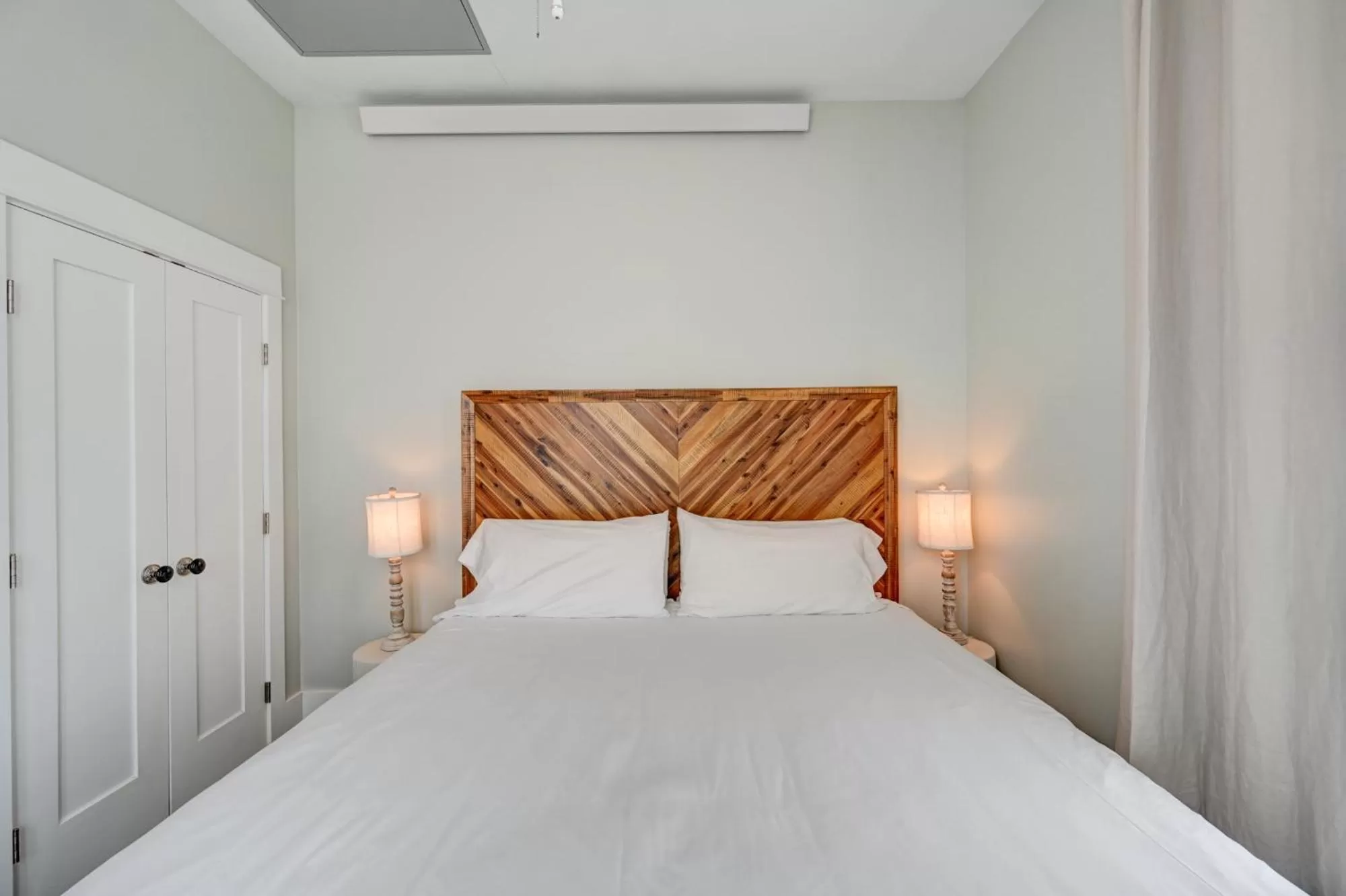 Bed in South Main Residences by Surf Hotel
