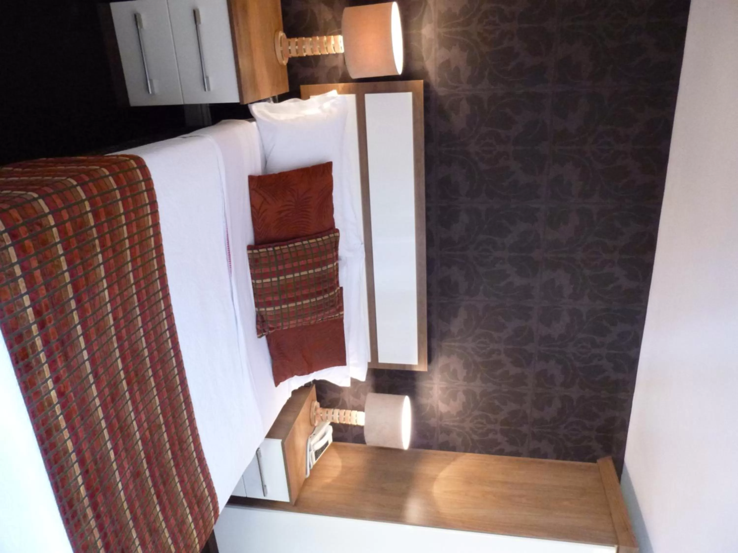 Bed in The White Lady Hotel