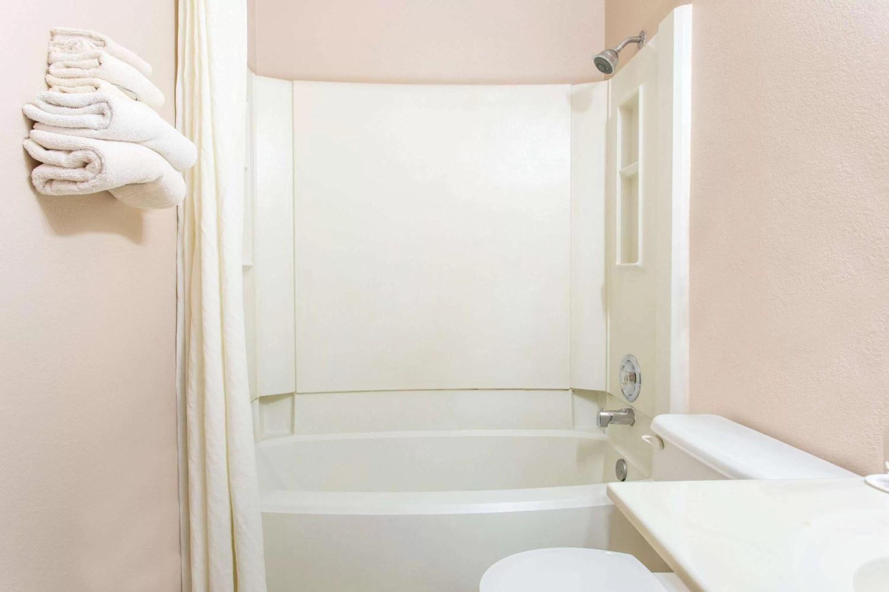 Bathroom in Super 8 by Wyndham Austin MN