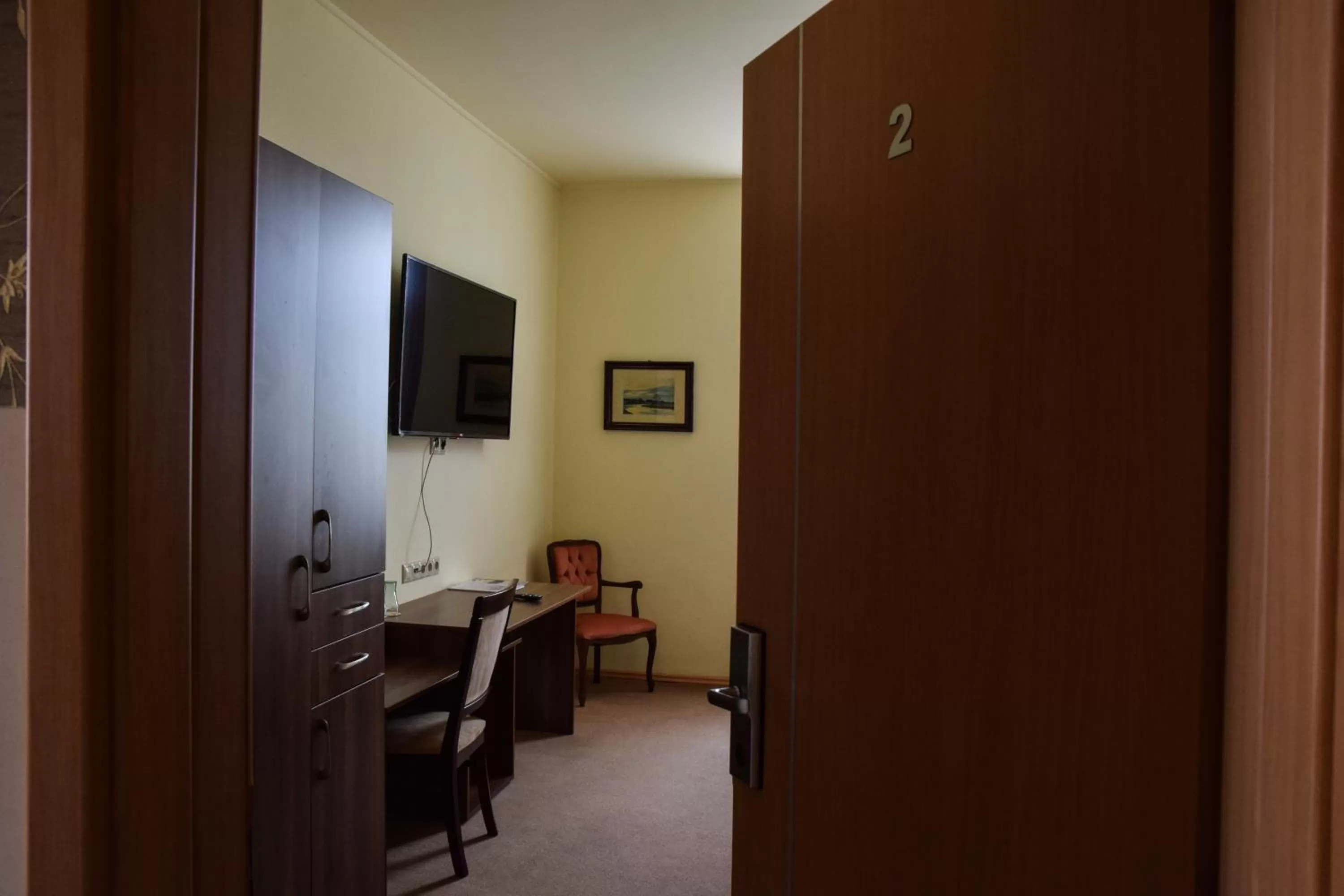 Photo of the whole room, TV/Entertainment Center in Körös Panzió és Étterem