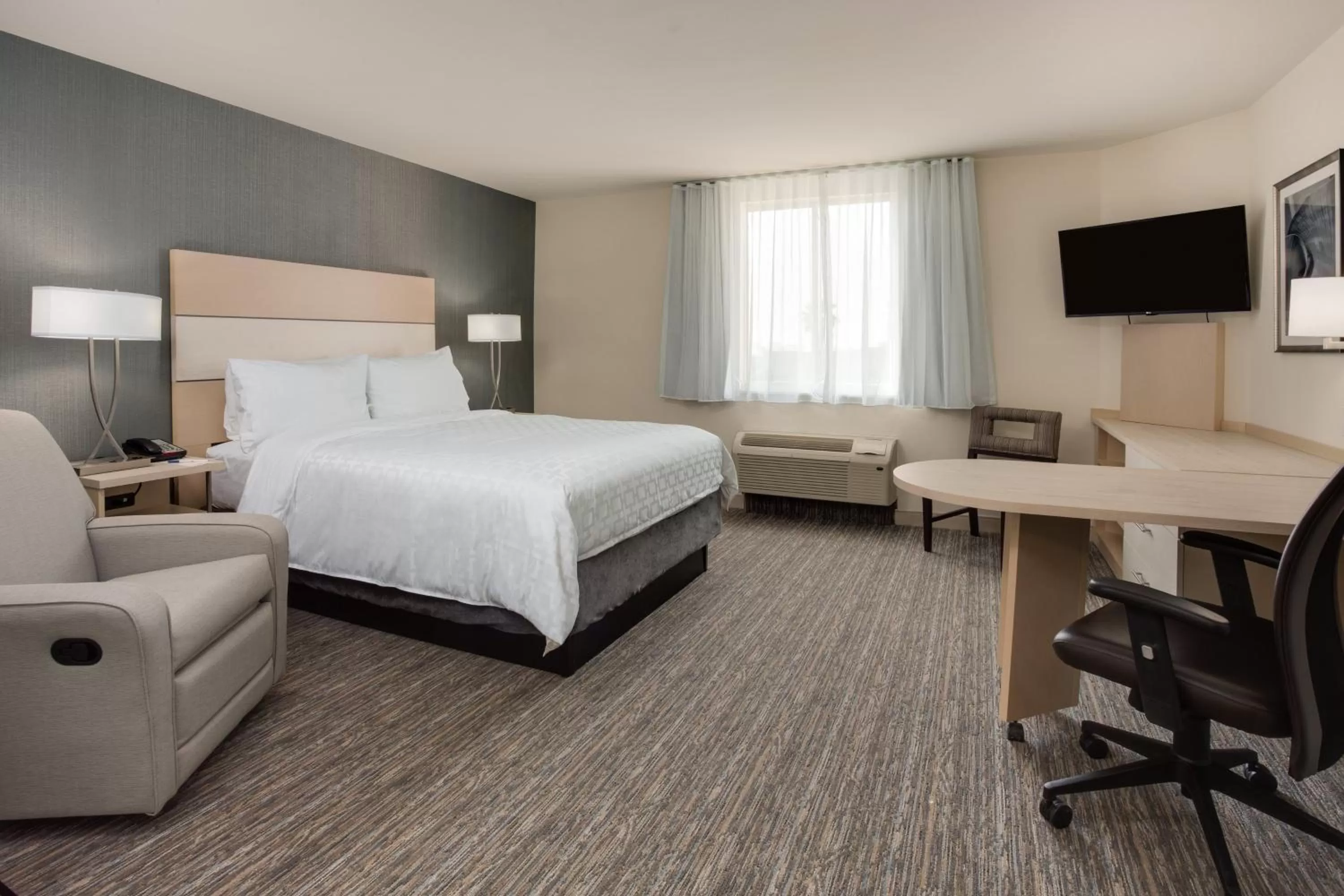 Photo of the whole room, Bed in Candlewood Suites Miami Intl Airport - 36th St by IHG