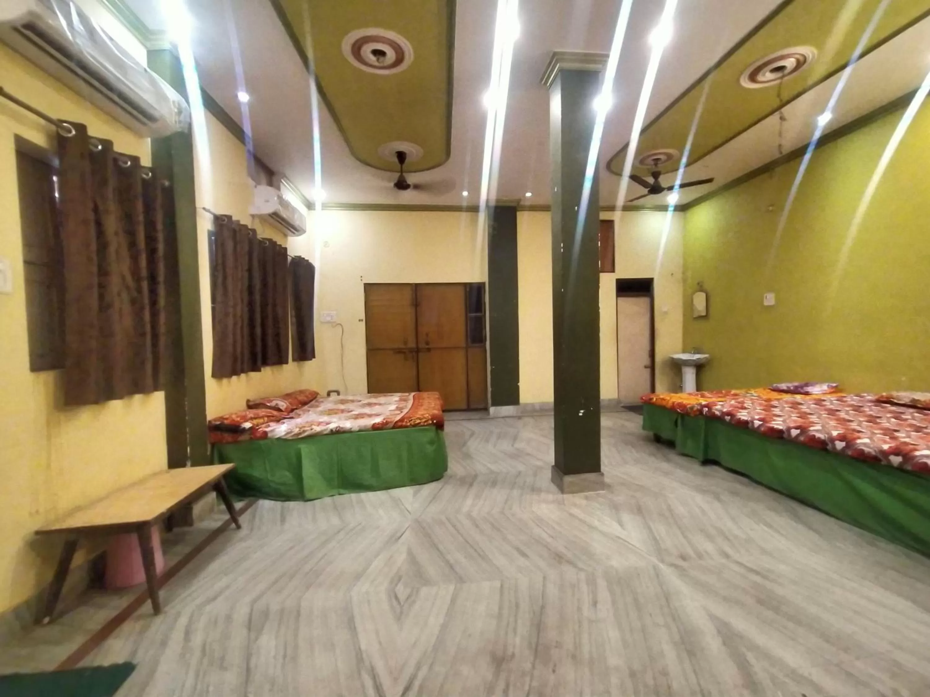 Photo of the whole room, Bed in Hotel Aakash Ganga