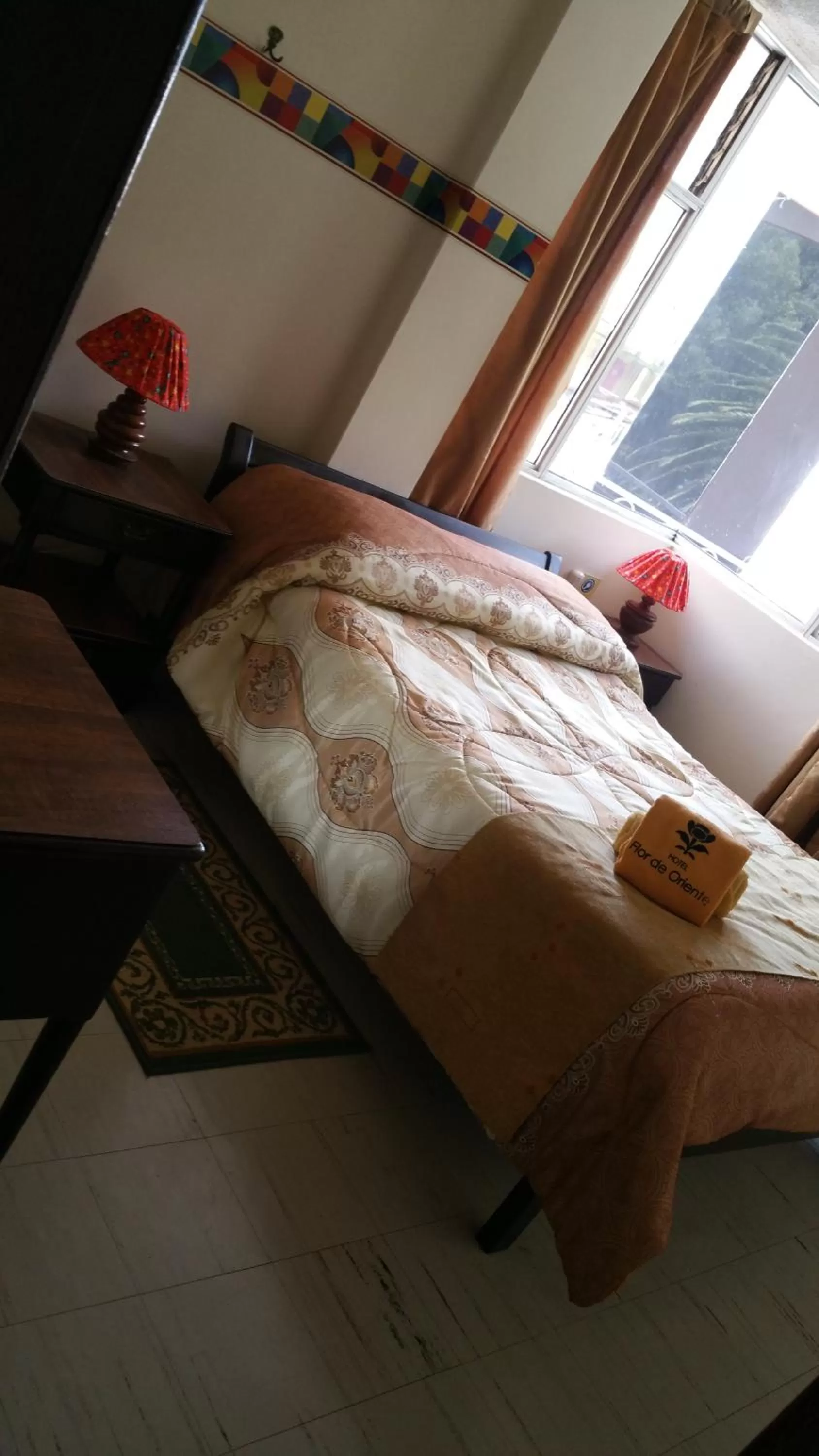 Bed in Hotel Flor de Oriente