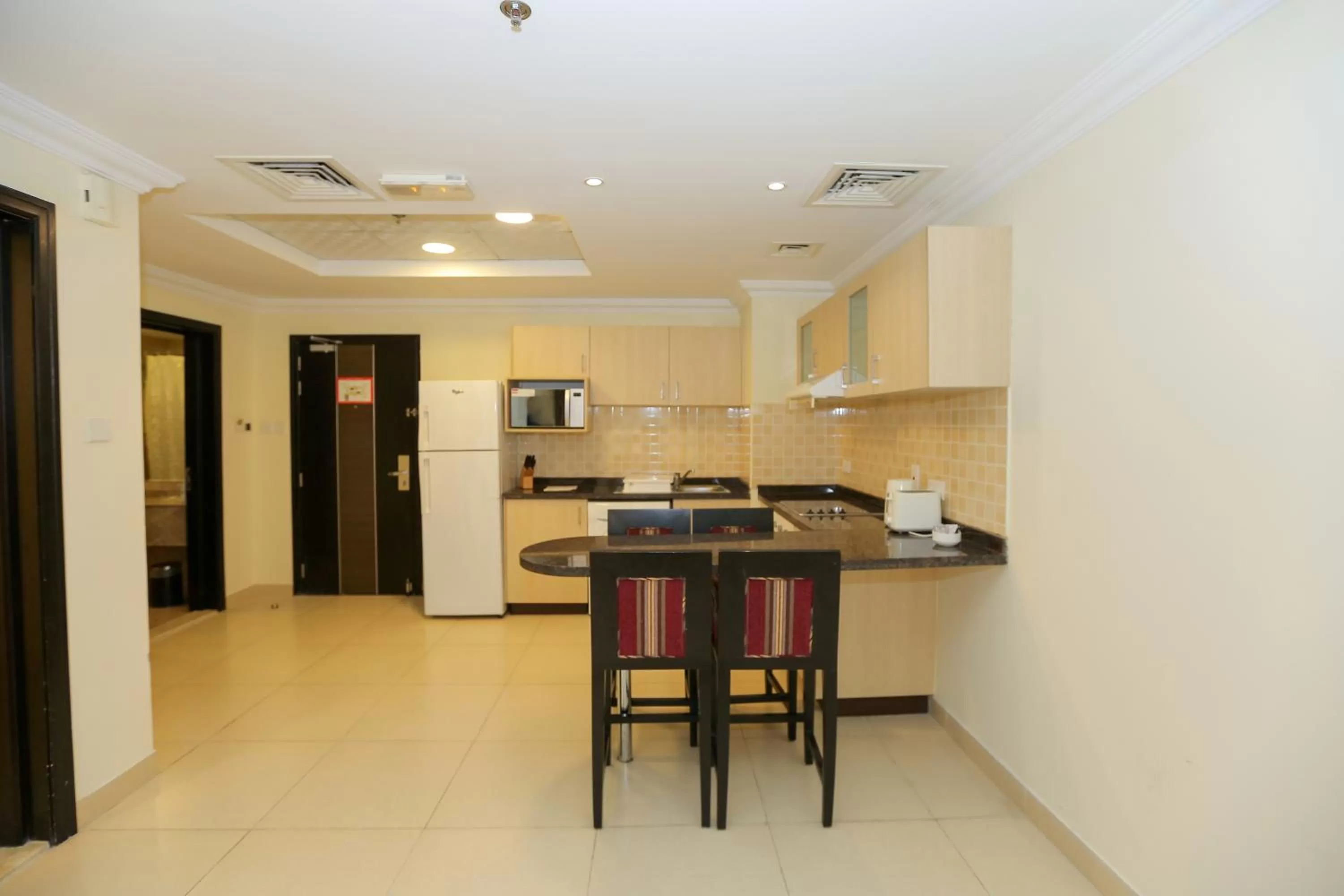 Kitchen or kitchenette in Ivory Grand Hotel Apartments
