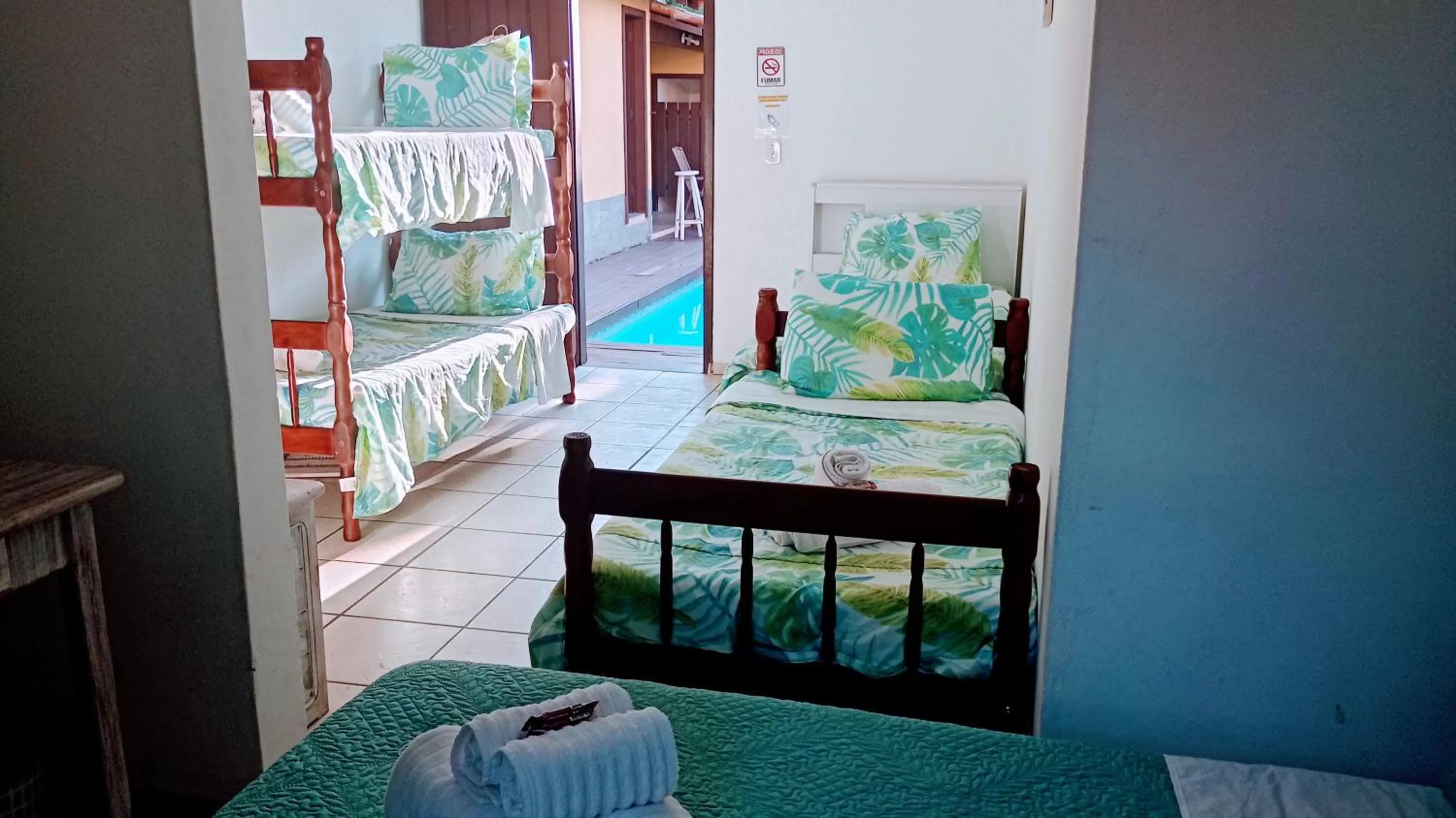 Bed, Pool View in Hibiscos Pousada