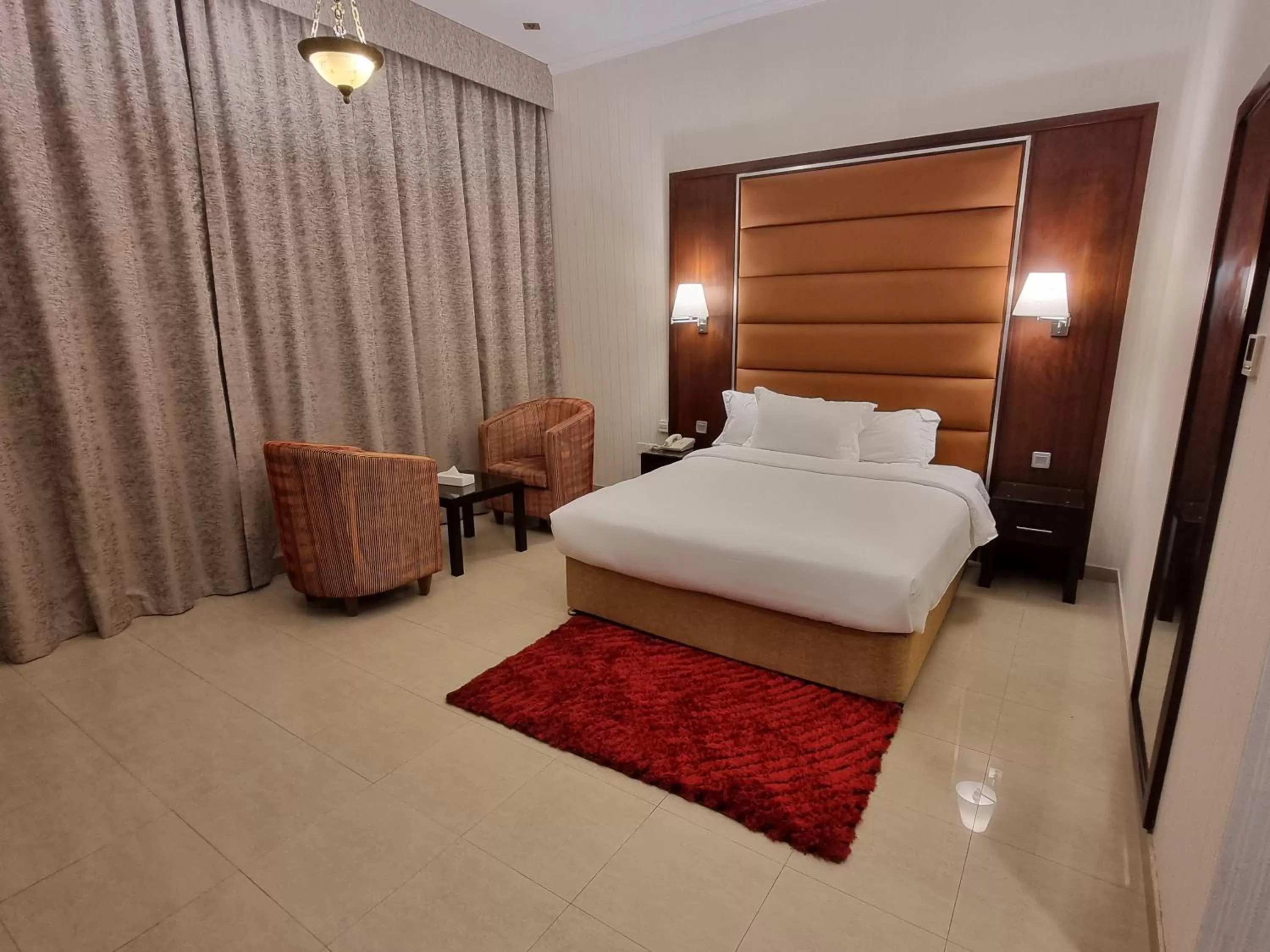 Bed in Vista City Hotel