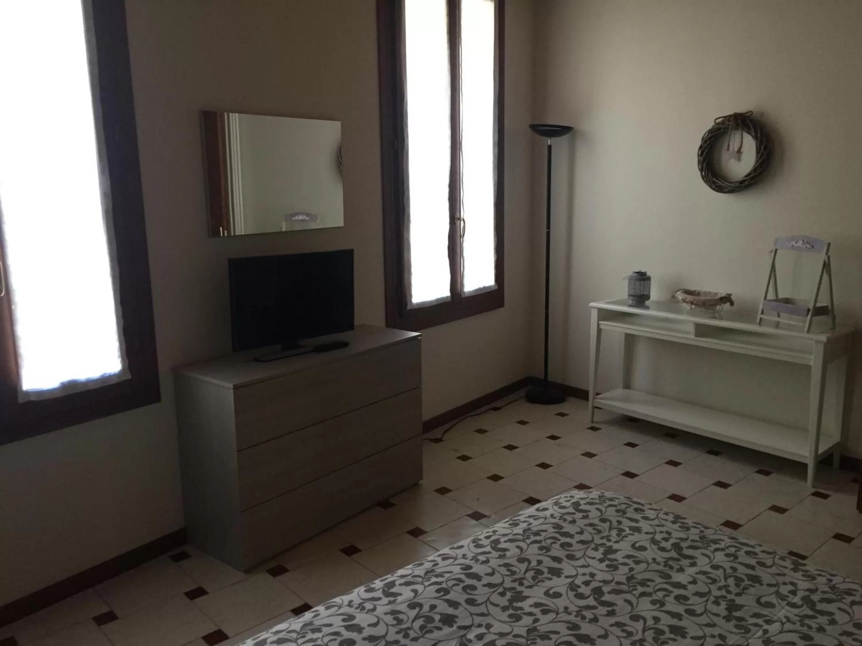 Bed, TV/Entertainment Center in B&B Via Garibaldi