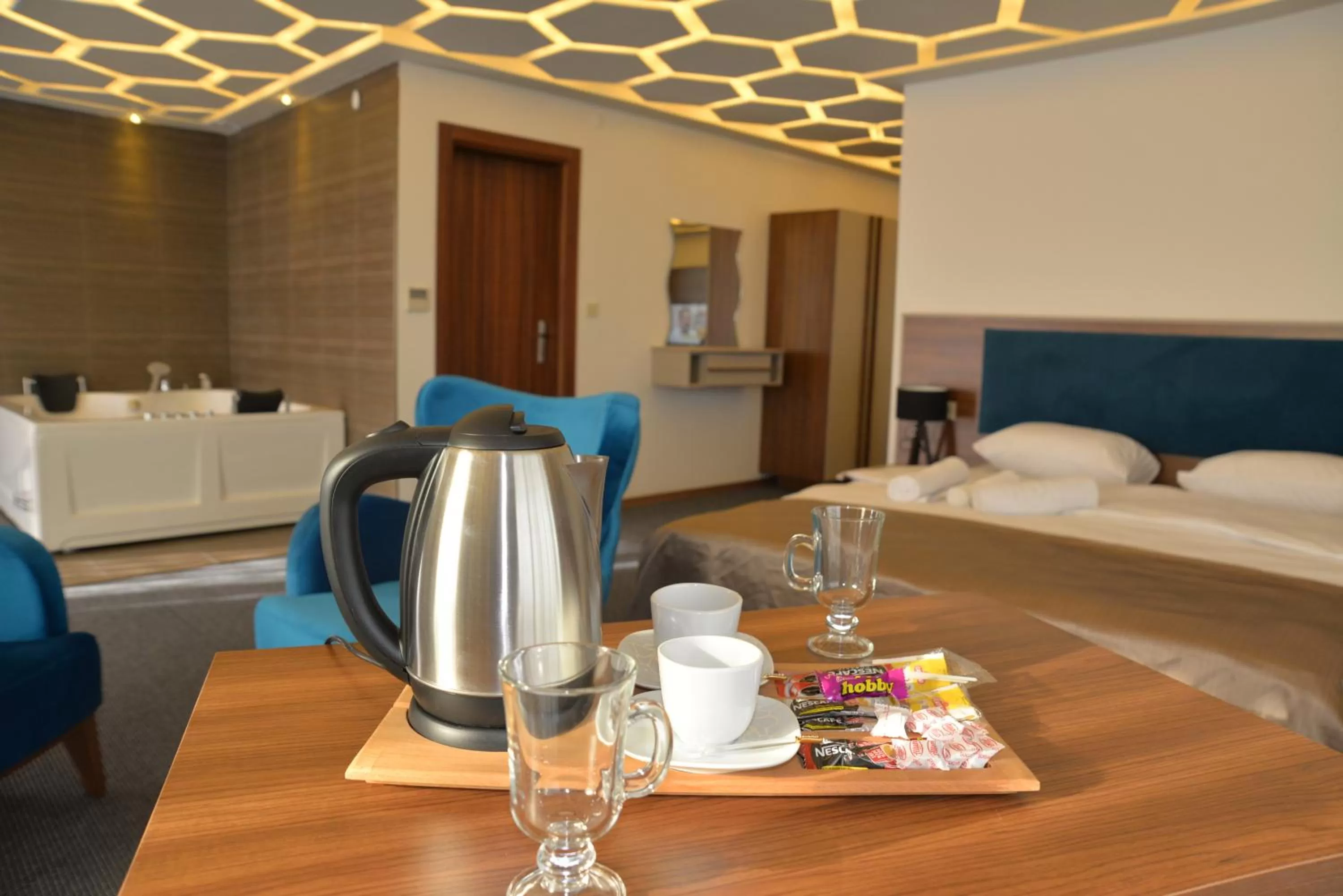 Bed in TEVETOGLU HOTEL