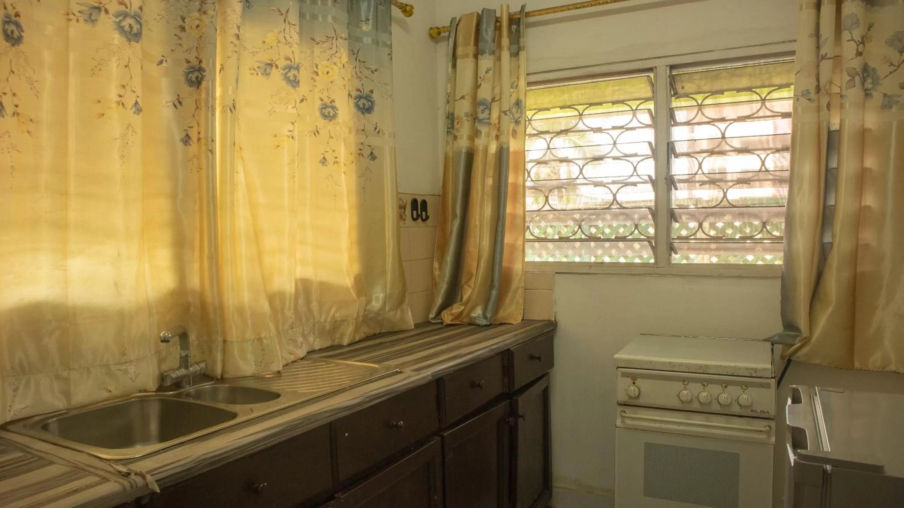 Kitchen or kitchenette in Pekan Hotel