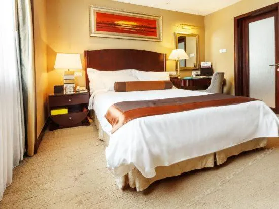 Photo of the whole room, Bed in Grand International Hotel