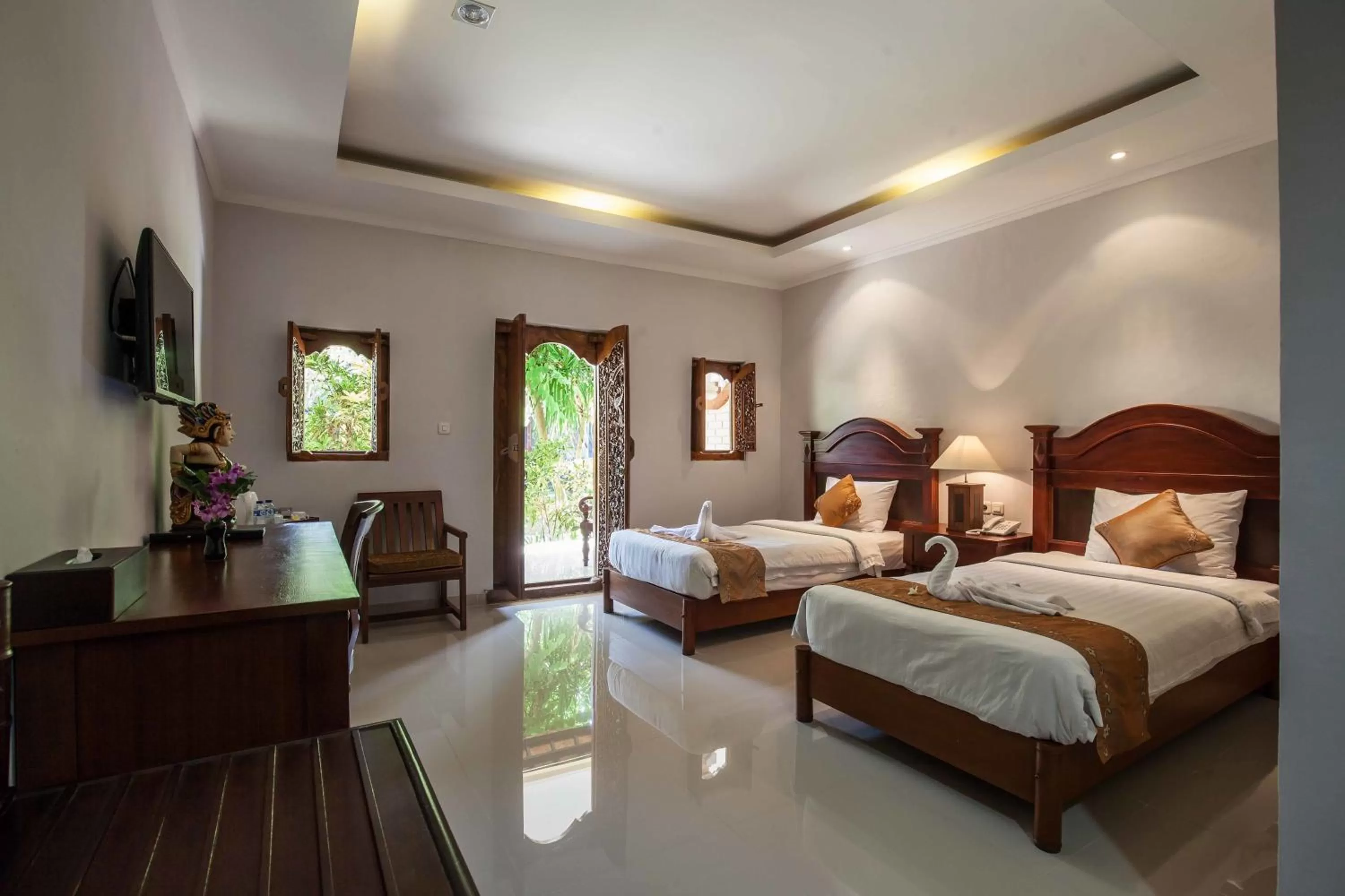 Bed in Vila Shanti Beach Front Hotel Sanur