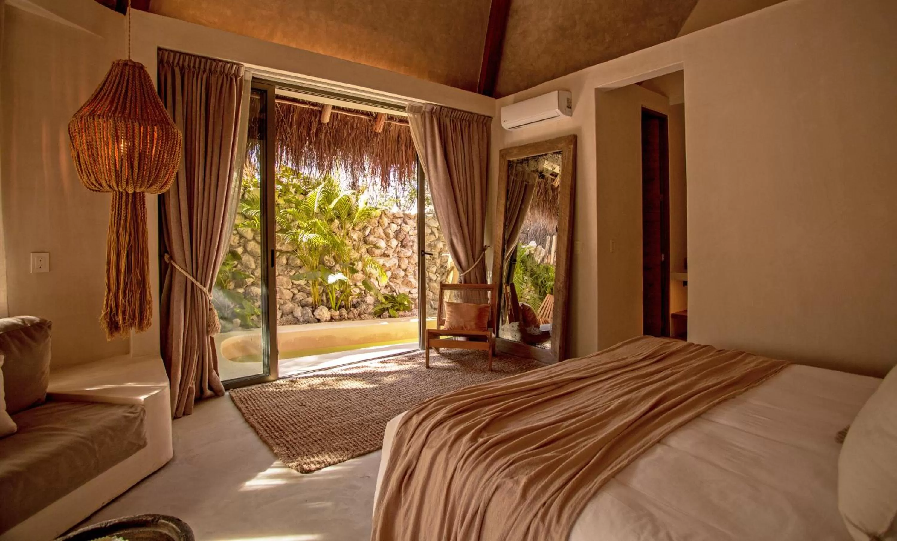 Bed in Hotel Muaré Tulum Wellness and Spa