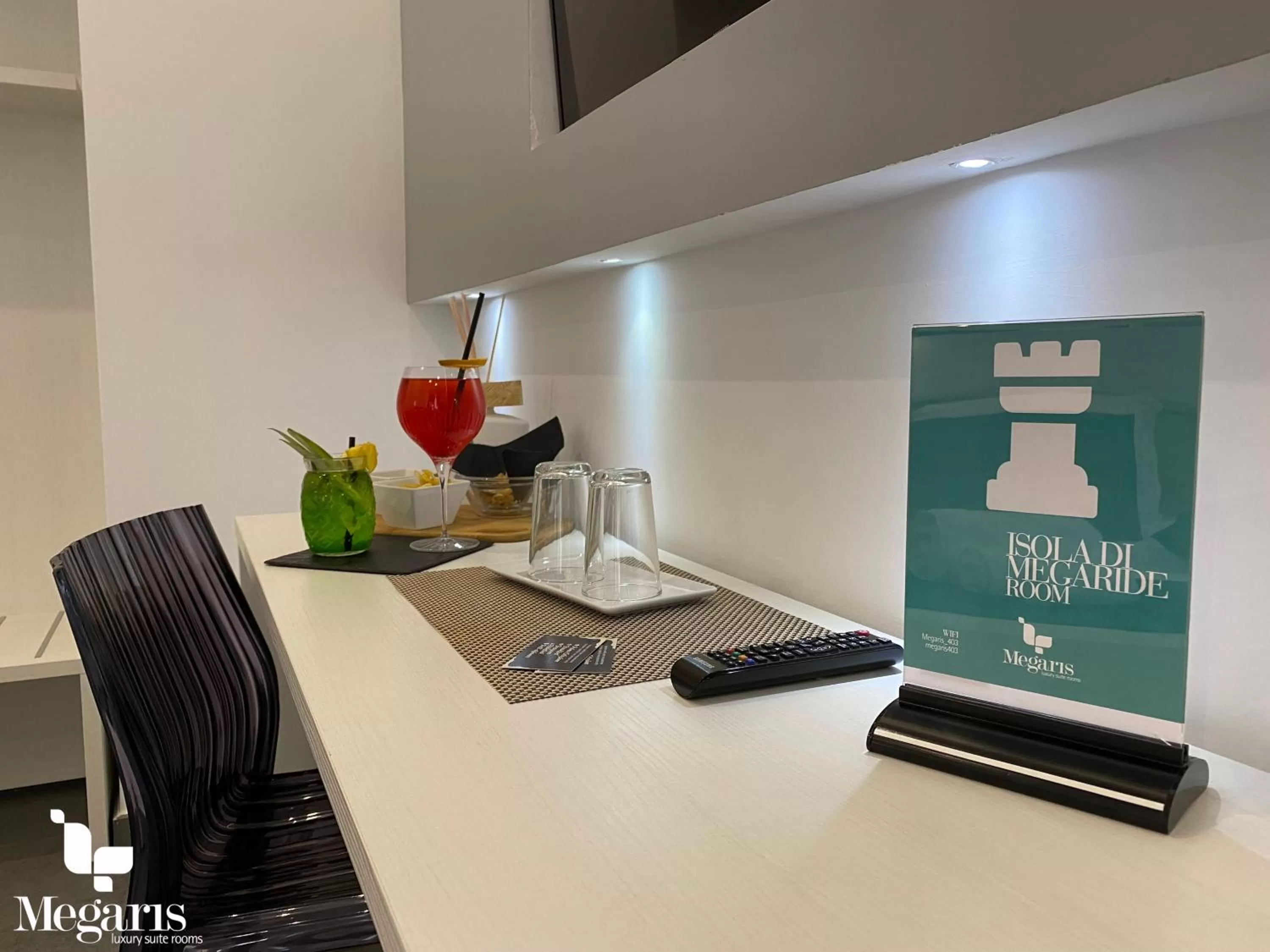 TV and multimedia, TV/Entertainment Center in Megaris Luxury Suite Rooms