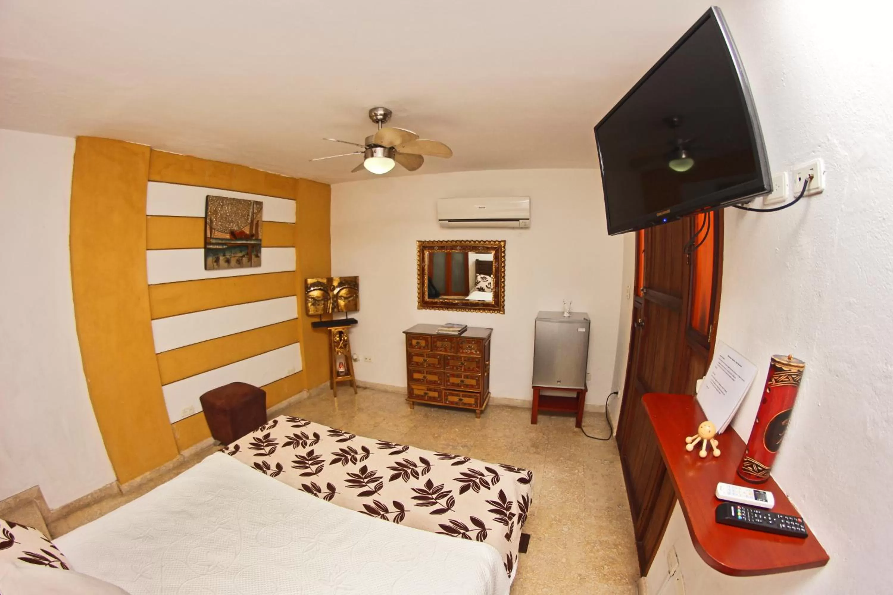 Photo of the whole room, TV/Entertainment Center in Hotel Casa Gloria Boutique