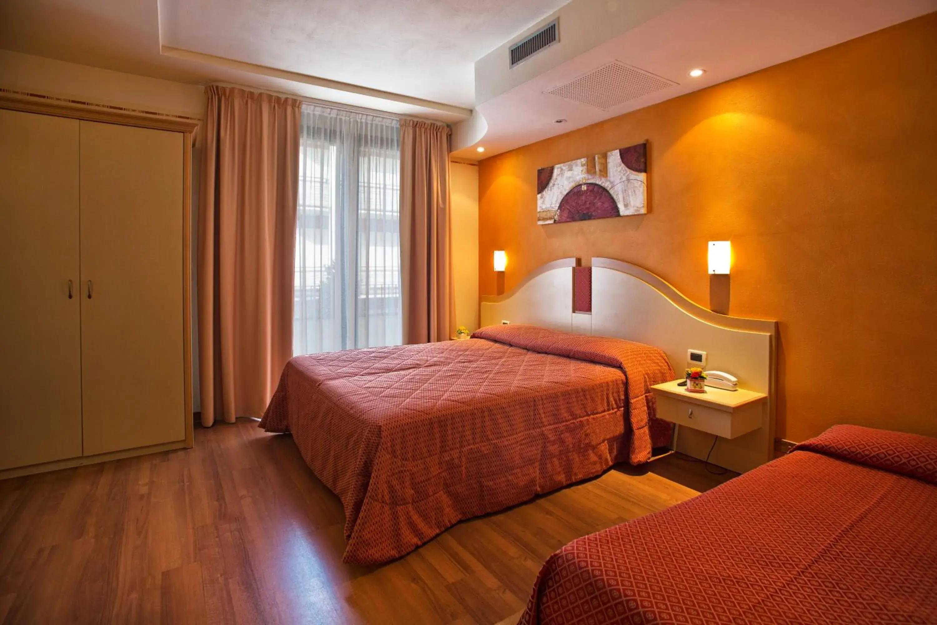 Triple Room with Lake View in Hotel La Rondine Triple Room with Lake View in Hotel La Rondine