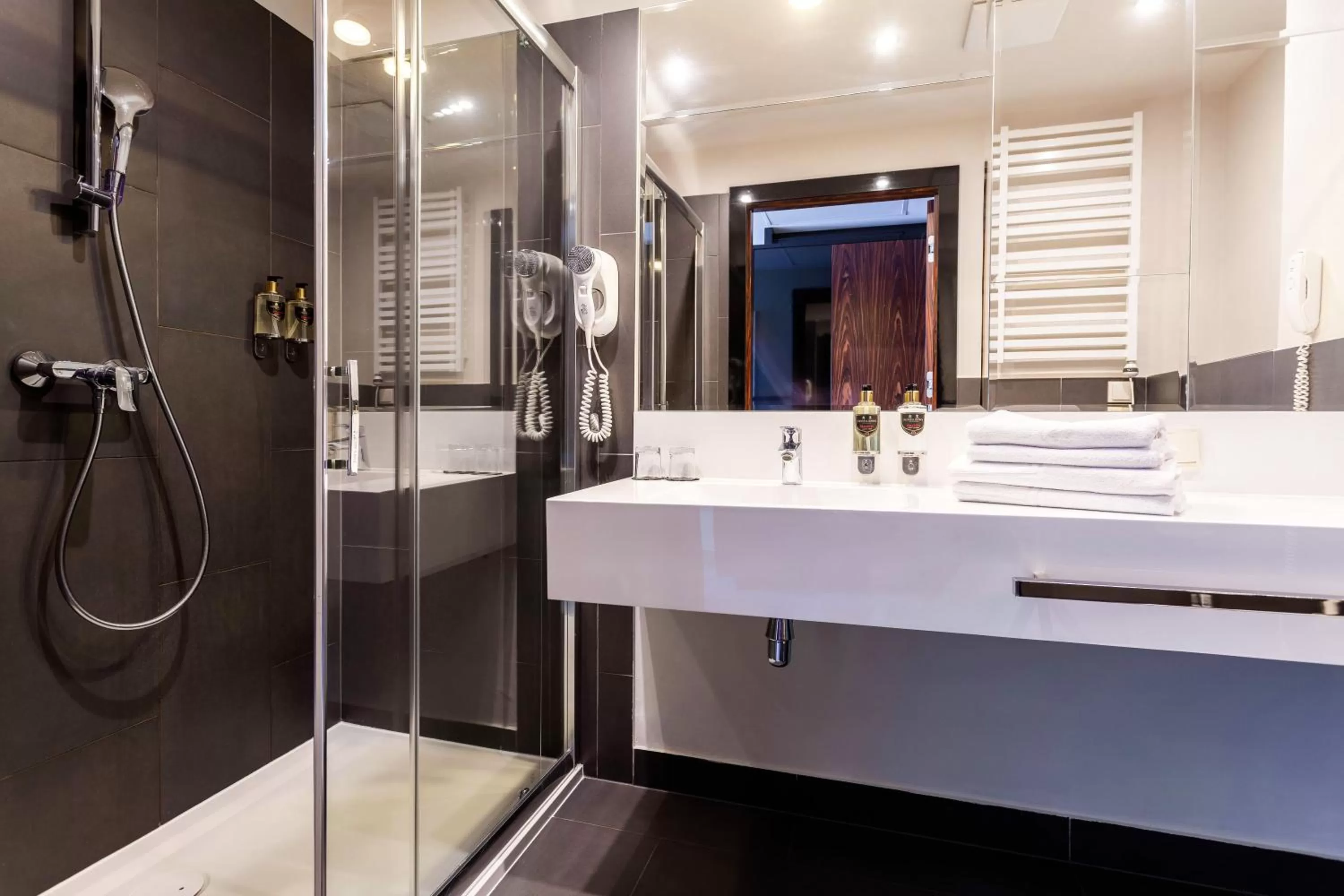 Bathroom in Diune Resort by Zdrojowa