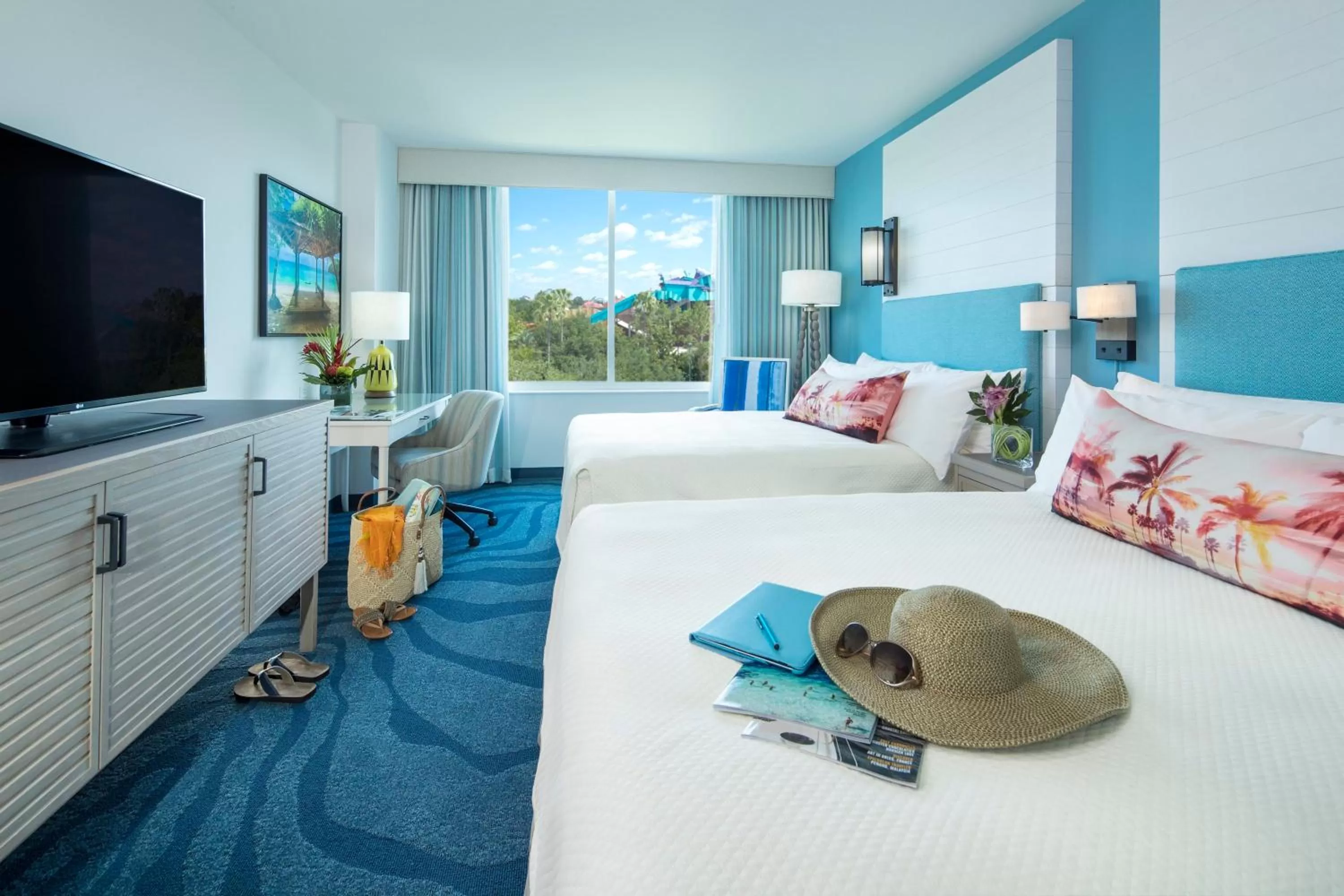 Photo of the whole room, Bed in Universal's Loews Sapphire Falls Resort
