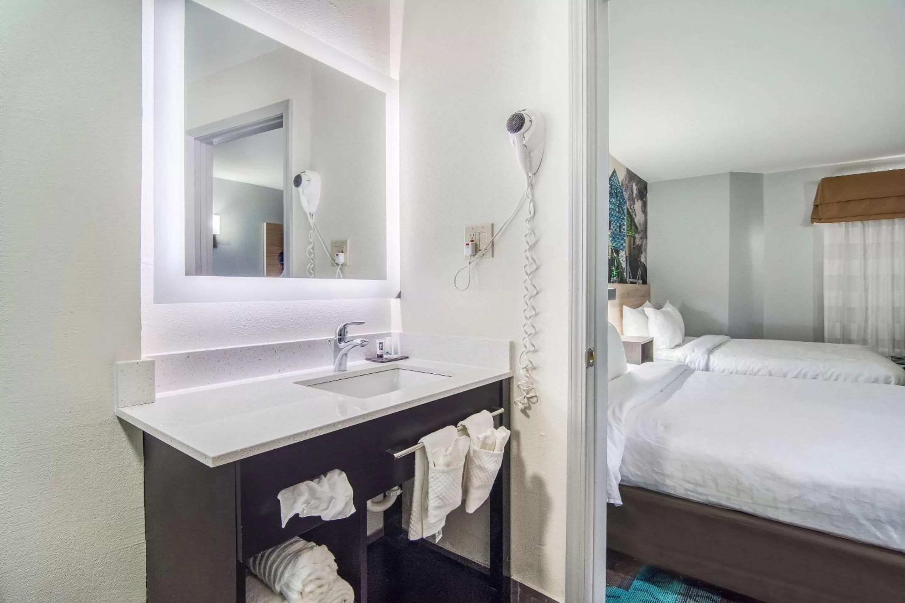 Bathroom, Bed in Clarion Pointe Wake Forest - Raleigh North