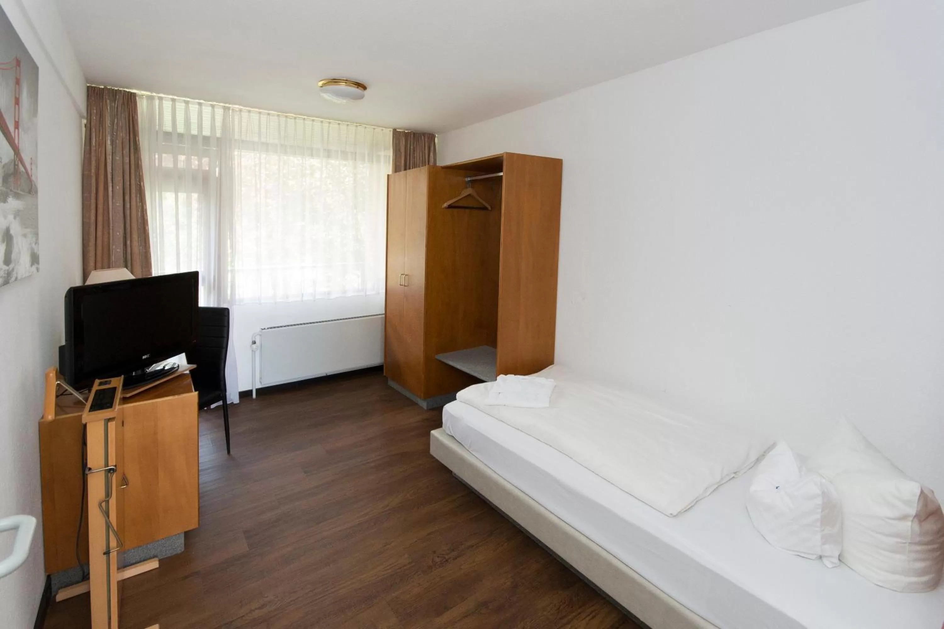 Photo of the whole room, Bed in Hotel am Wasserturm