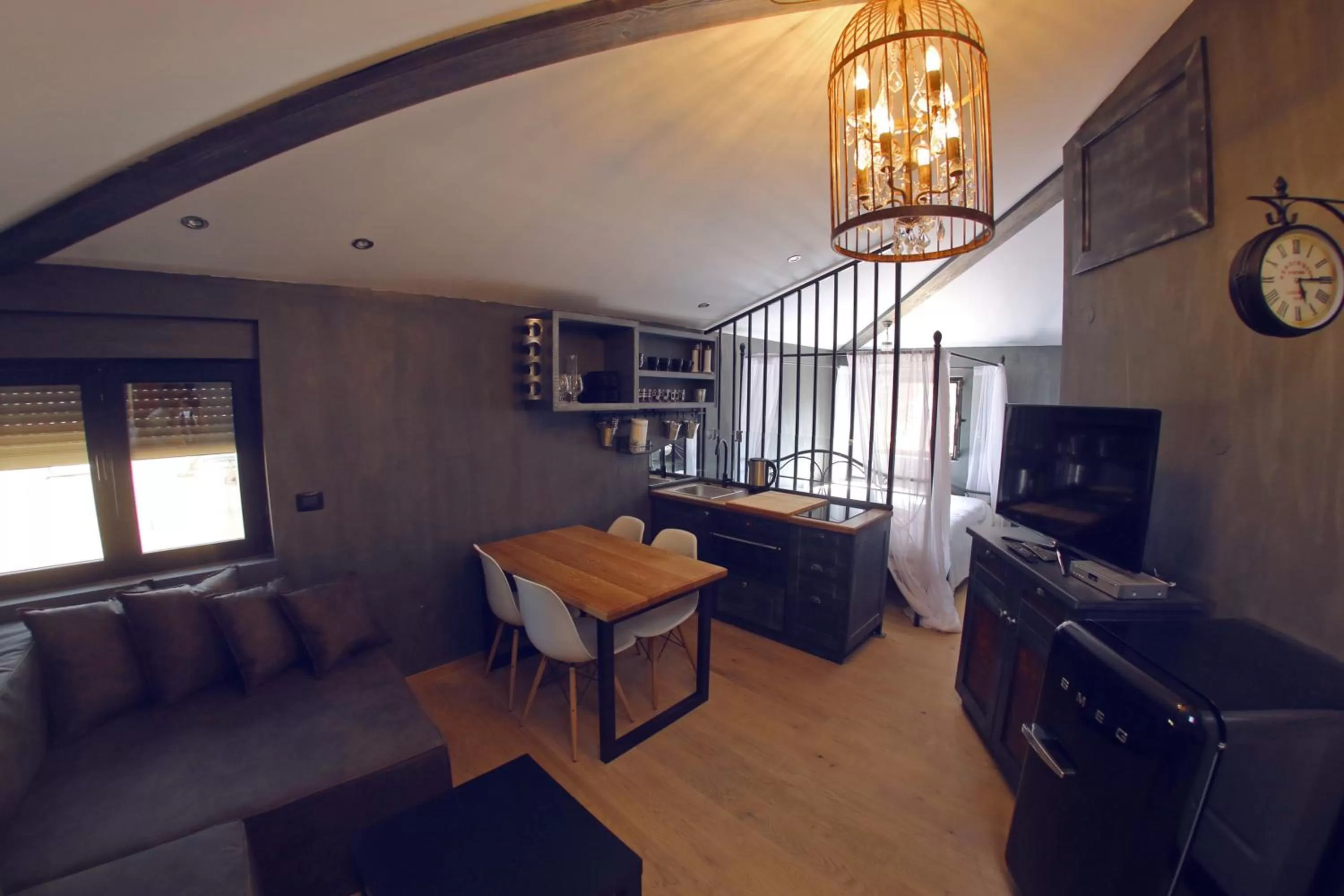 TV and multimedia in Central Apartments Integrated Hotel