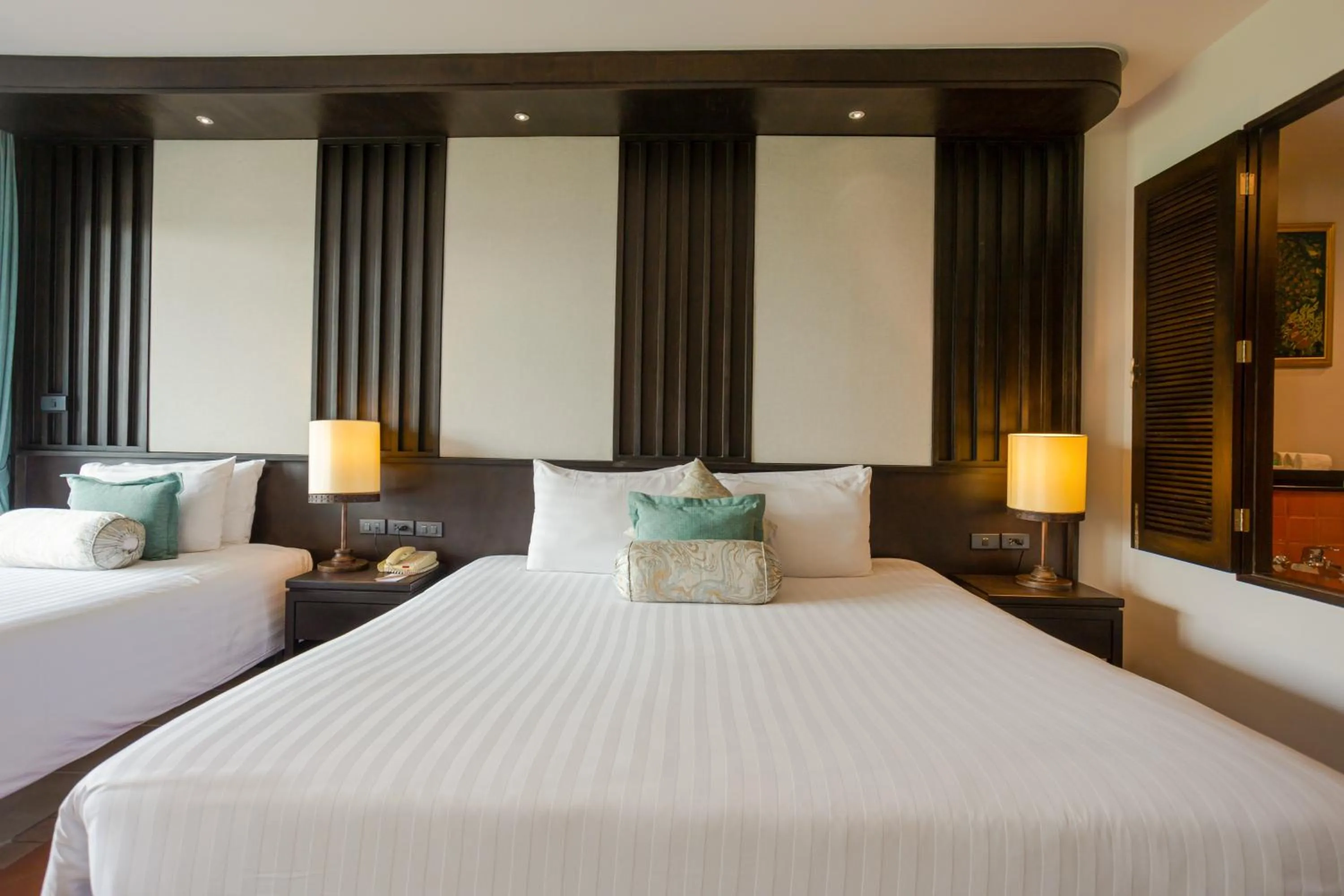 Bed in Ravindra Beach Resort & Spa - SHA Extra Plus