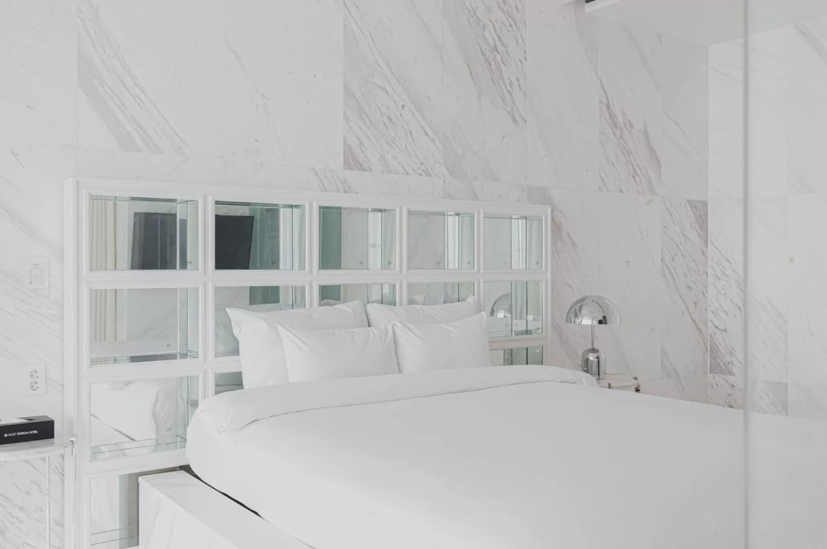 Bed in ACC Design Hotel