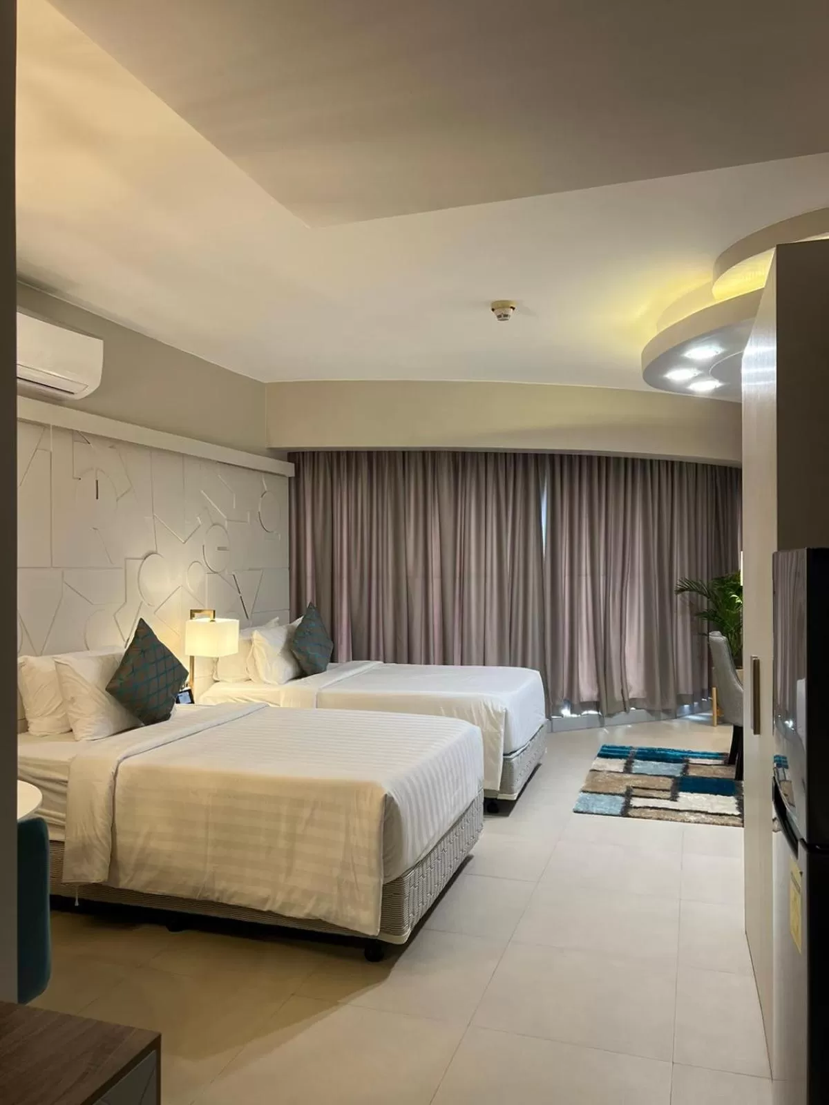 Bedroom, Bed in AEON SUITES Staycation
